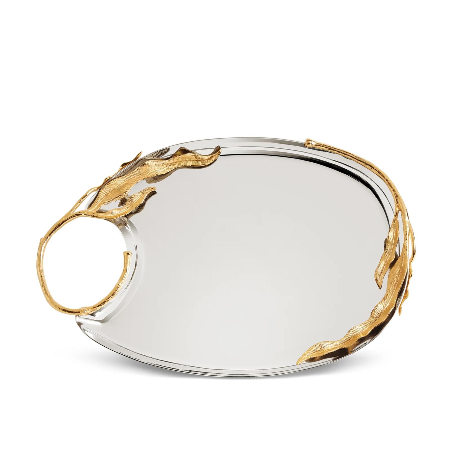 Tray Ondulated Leaves Medium all in stainless steel
in polished finish with gold-plated (24K) details.