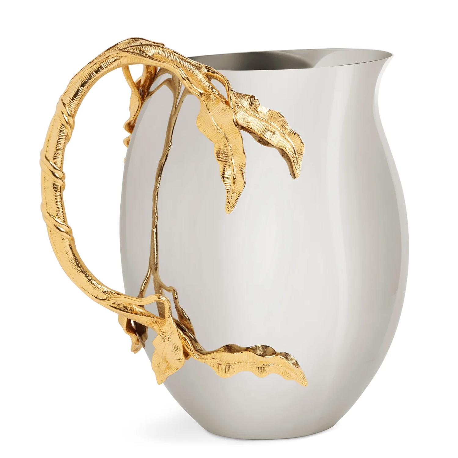 Pitcher Ondulated Leaves with all structure in forged 
stainless steel. Whit 24k gold plated details.
Also available on request in Ondulated Leaves Bowl on Stand,
or in Ondulated Leaves Champagne Cooler, or in Ondulated 
Leaves Bowl.