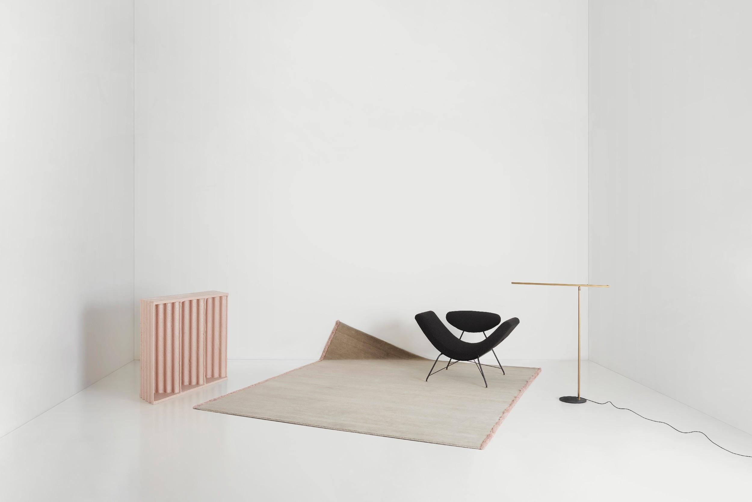 The Ondulato Fiberglass Console explores corrugated sheet material where the territory in which the item is made dictates the finish. The Console is part of a larger collection developed during an artist residency. Corrugated sheets, a beautifully