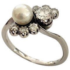 One '1' 14 Karat Gold Ring, Set with Diamonds and One '1' Cultured Pearl, 1940