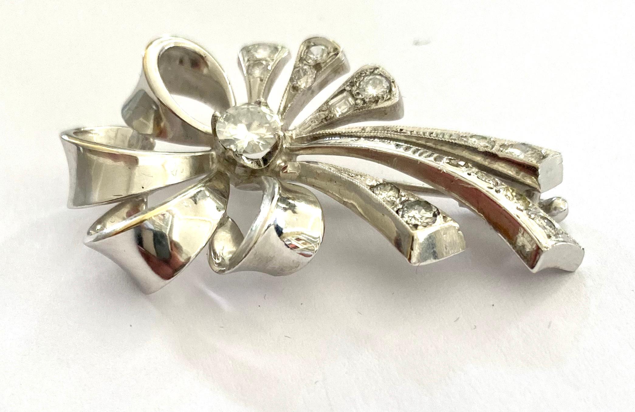 white gold brooches