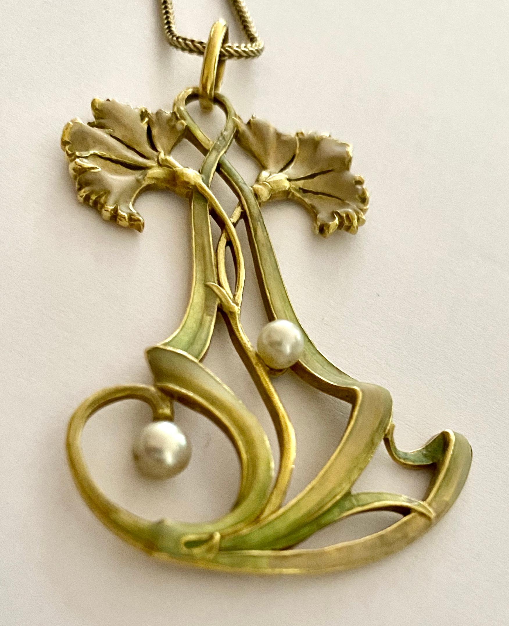 An 18K. Yellow gold pendant, Art Nouveau, attributed to Henry Vever,  see The Belle Epoque of French Jewelery 1850-1910, Thomas Heneage & Co Lim. London 1990 page: 207
Paris 1900.
weight: 15.58 grams. 2 saltwater pearls of approximately 4 mm