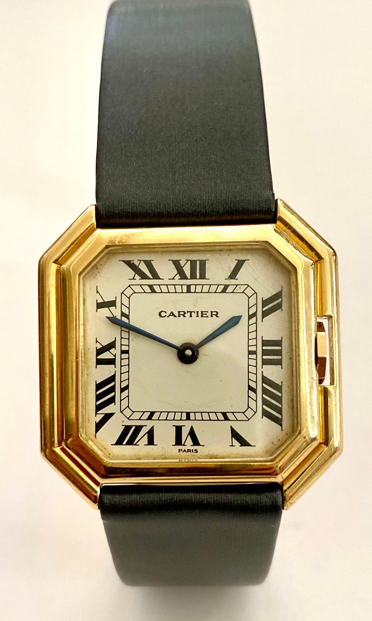 One (1) 18K. Yellow Gold Cartier wirstwatch with a leather strap and a 18K. yellow Gold Buccle
Model: Cienture, automatic ref, nr: 178011 
Auitomatic movement from Eta (swiss)
Year of production ca 1975 (this is watch nr 263 from this