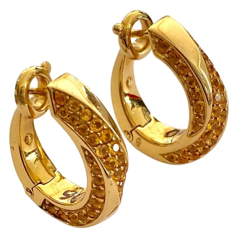 One '1' Pair of 18 Karat Gold Earrings, Yellow sapphires, "Mauboussin", 2000