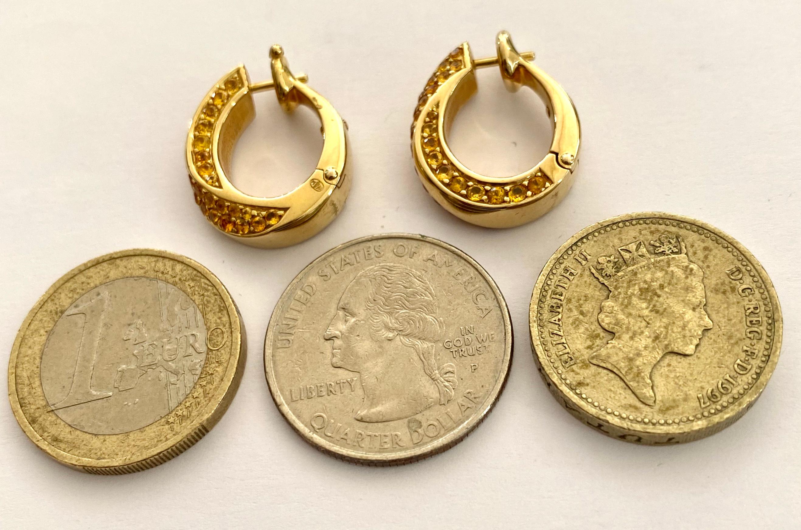 One '1' Pair of 18 Karat Gold Earrings, Yellow sapphires, 