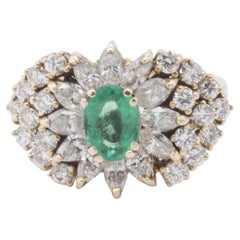 One 14kt Ladies Stamped Emerald and Diamond Ring