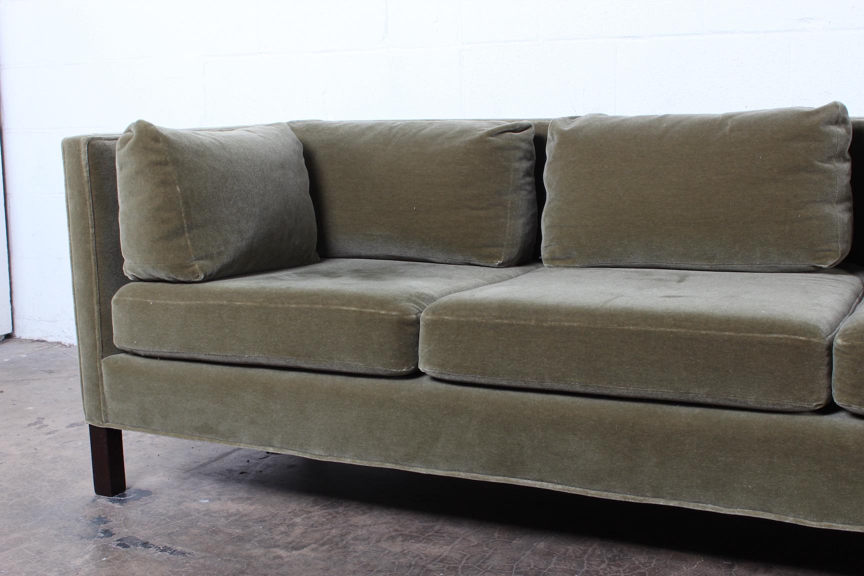 A one arm sofa designed by Edward Wormley for Dunbar in mohair.