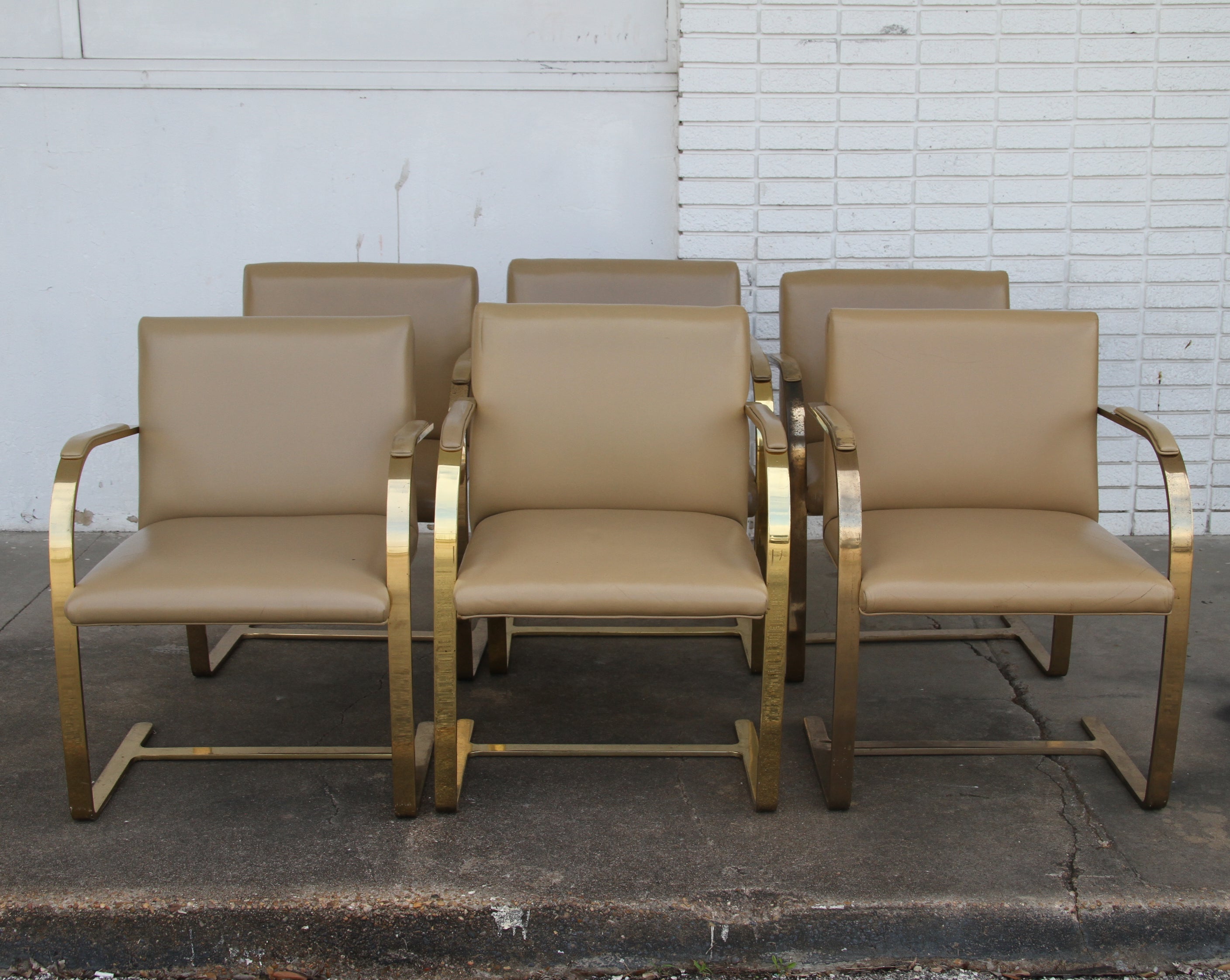 Rare vintage Brno chair designed by Mies van der Rohe. These chairs were a special order with bronze flat bar frames for a prominent law firm in Texas.

 Age appropriate wear, sold as is.
Large quantities available.

Dimensions: Height: 31.5 in