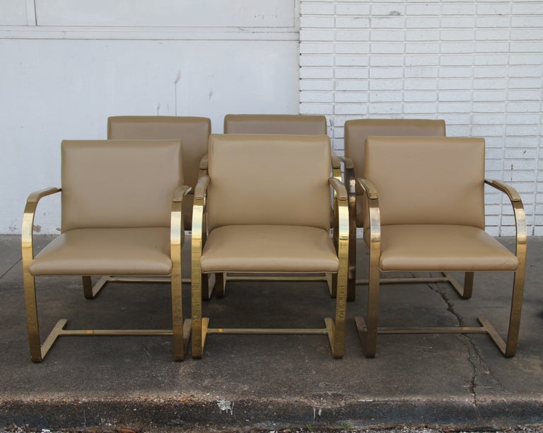 Rare vintage Brno chair designed by Mies van der Rohe. These chairs were a special order with bronze flat bar frames for a prominent law firm in Texas.
We have 6 available in this finish.
 Age appropriate wear, sold as is.

Dimensions: Height: 31.5
