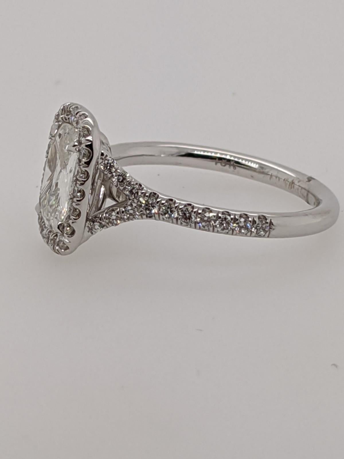 Classic 18 karat white gold split shank halo ring handmade in the United States.  Featuring a 1.04 carat E color VVS2 clarity antique style cushion with GIA grading report number 2175294290.

This listing is one of hundreds of cushion cut diamonds