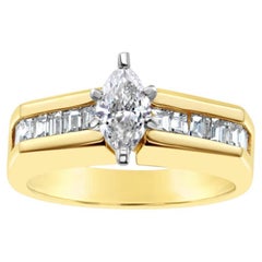 Anello di fidanzamento con diamante centrale Marquise e accenti Baguette da un carato