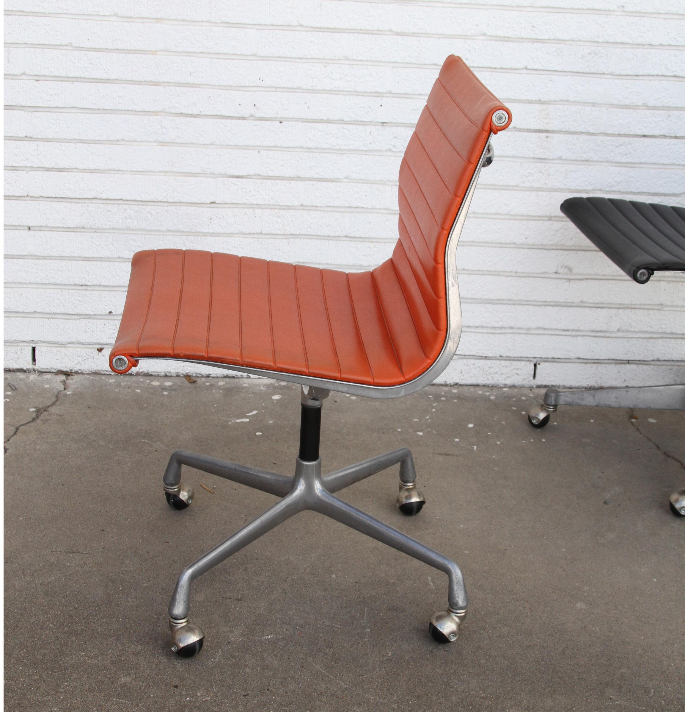 One Charles Eames Herman Miller aluminum group chair
1970s


Charles and Ray Eames aluminum group side chair, EA330 office conference chair in orange upholstery. The chair features a low-back with a lightweight aluminum frame. It has a 4-star