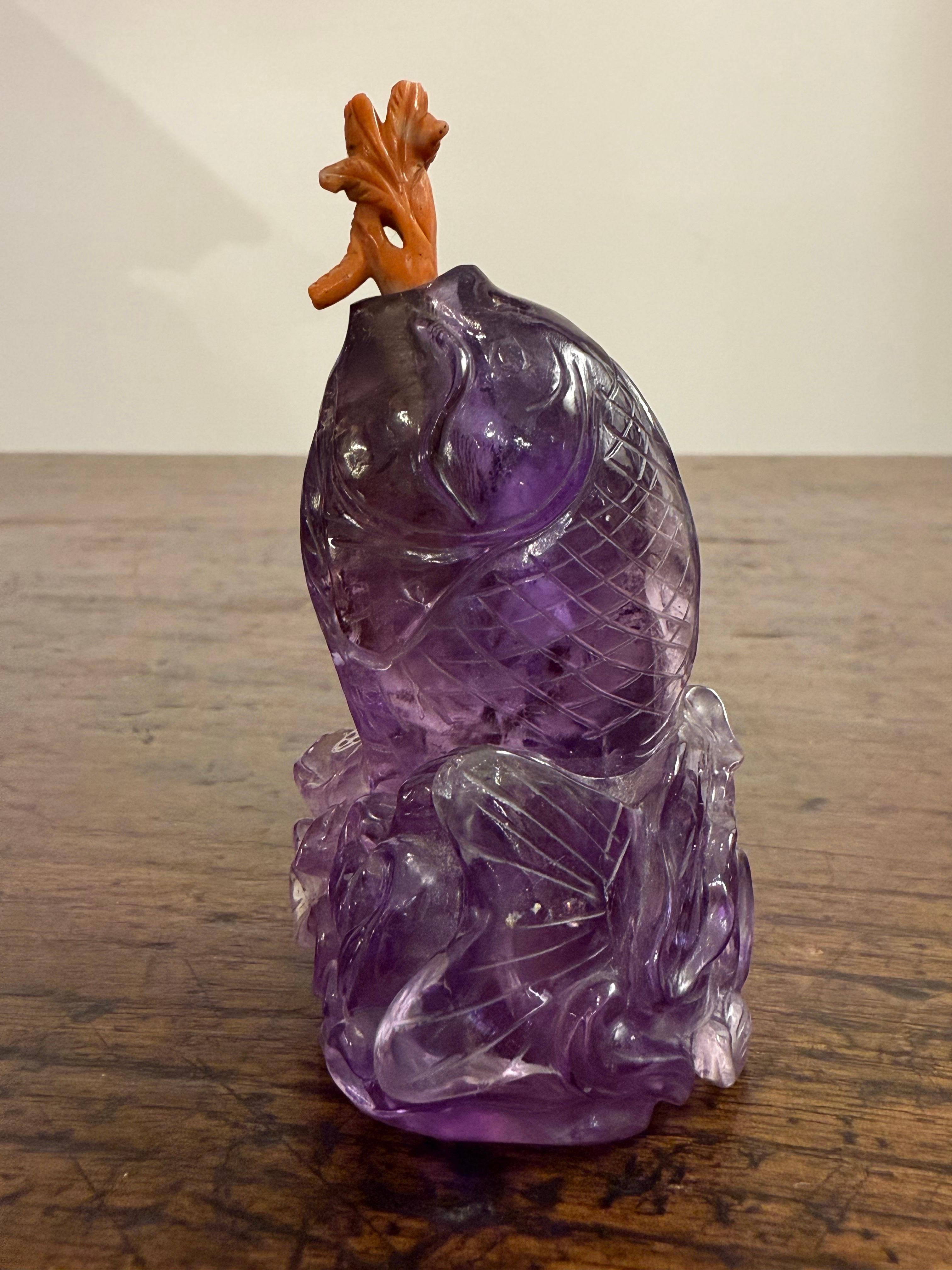 One Chinese Carved Carp Amethyst Snuff bottle, 18th Century

Provenance: Private UK Collection.

Dimensions:
Height: 8.5cm.
Width: 4cm.
Depth: 5.5cm.