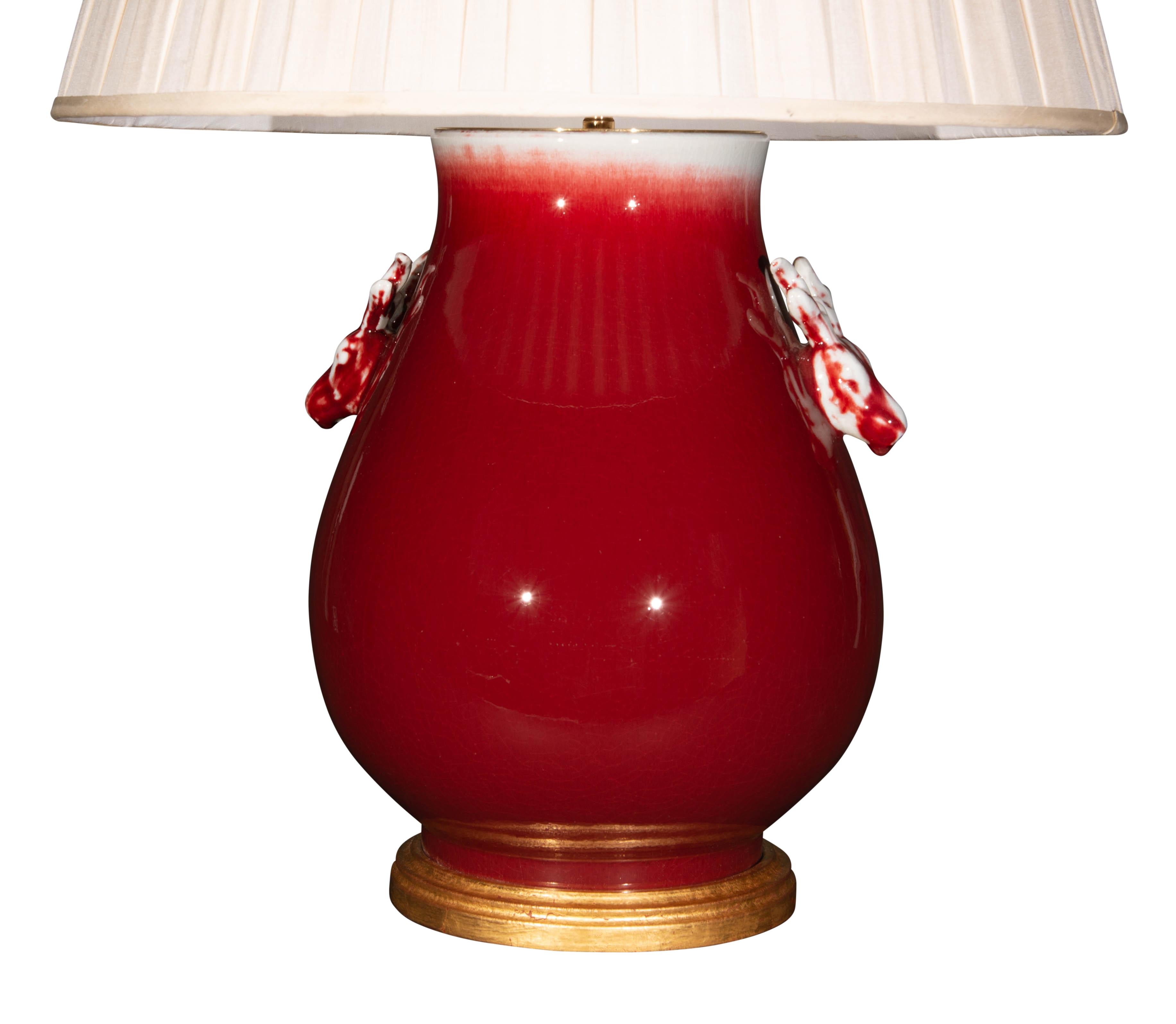 Glazed Chinese Sang De Boeuf Deer Head Porcelain Table Lamp, circa 1900 For Sale