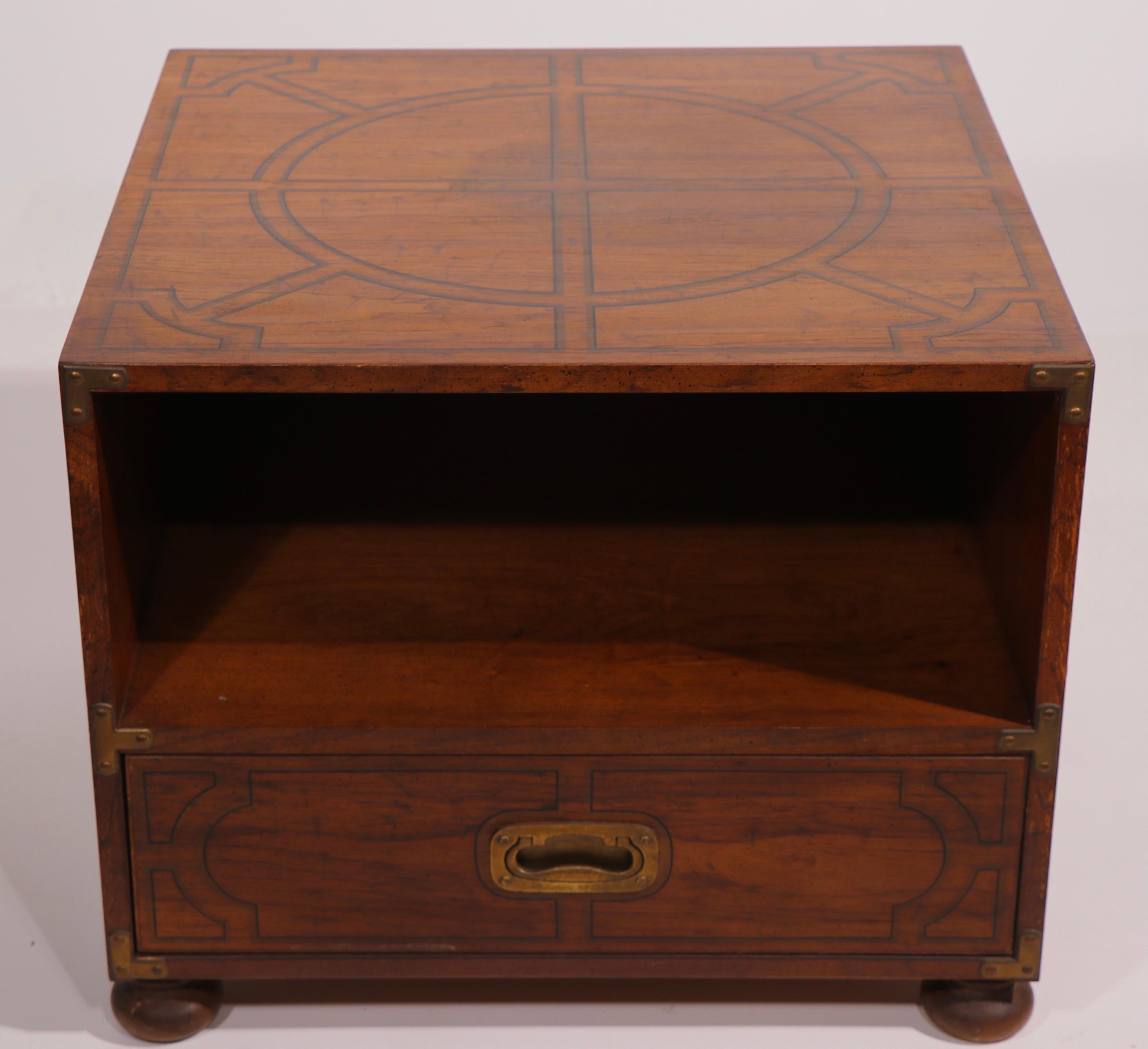 From one of the most stylish line of furniture produced by Drexel, this Oxford square end, or side table is in original, clean and ready to use condition. The table has an open storage space (9.75 in H) over one large drawer. The pecan wood case