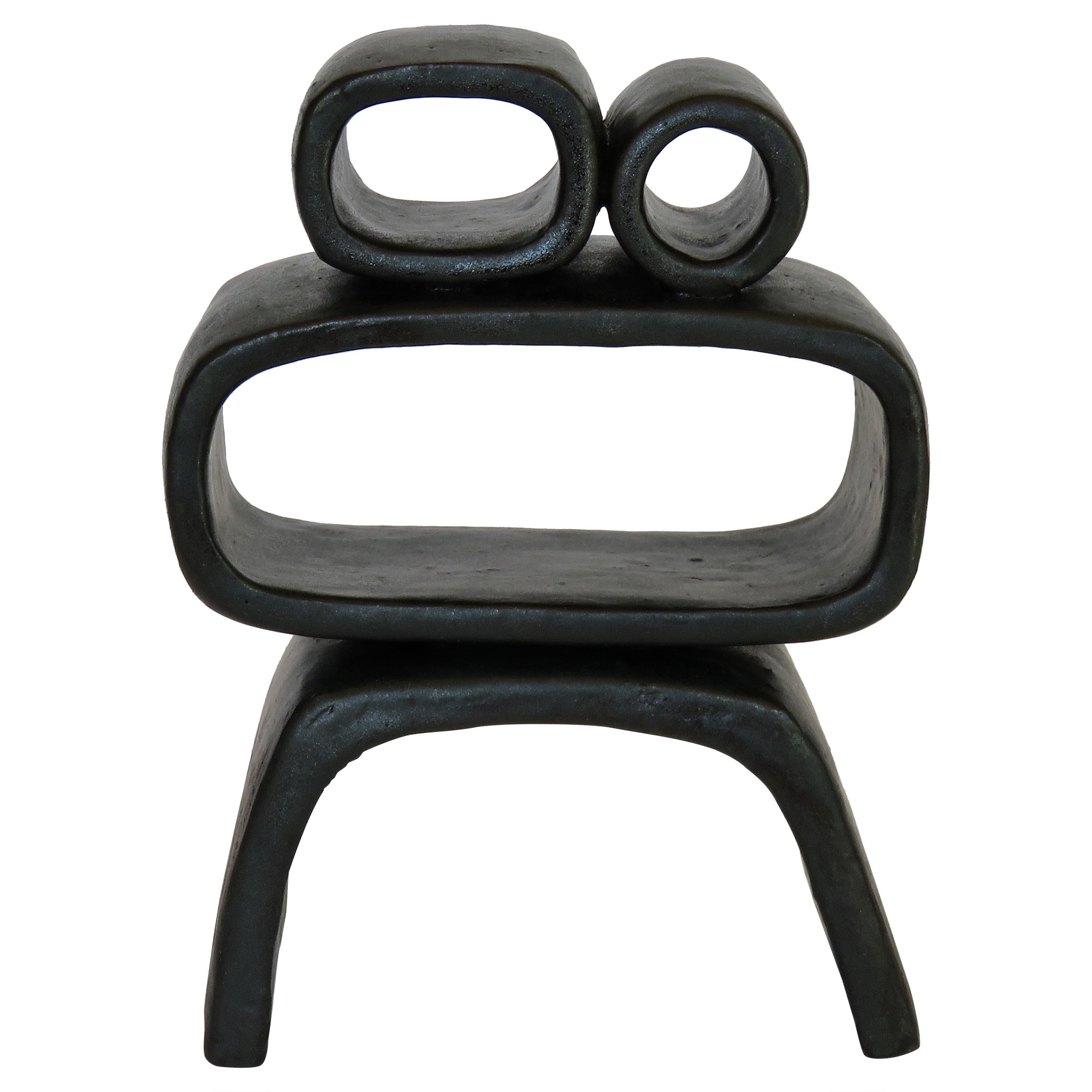 "One Eye" Metallic Black Hand-Built Ceramic Sculpture with Hollow Rings on Legs
