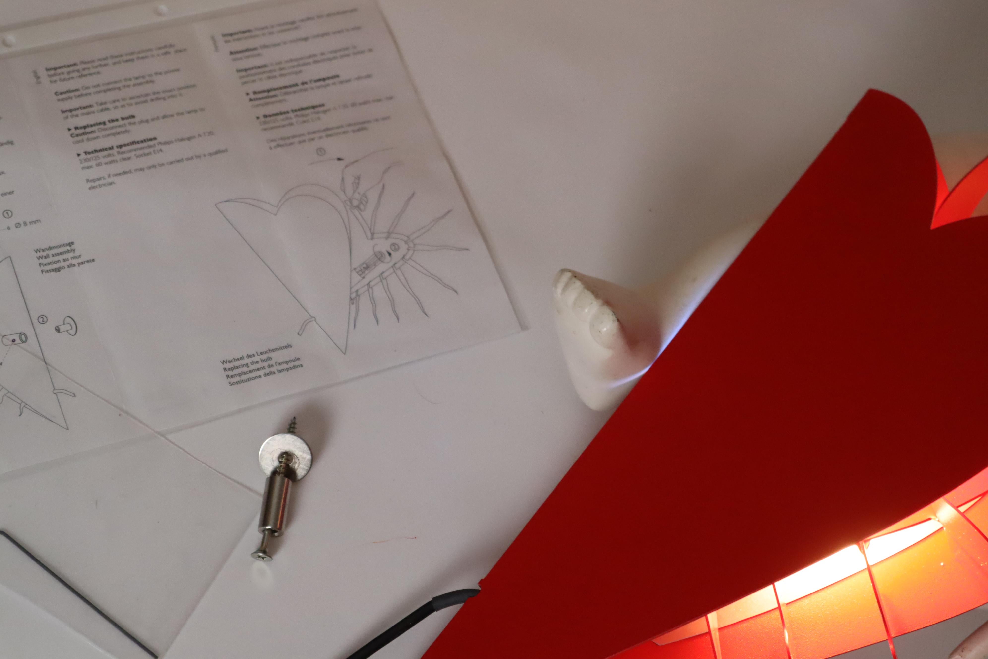 Metal One For The Recession Wall Lamp In A Red Heart Shape by Ingo Maurer 1994 For Sale