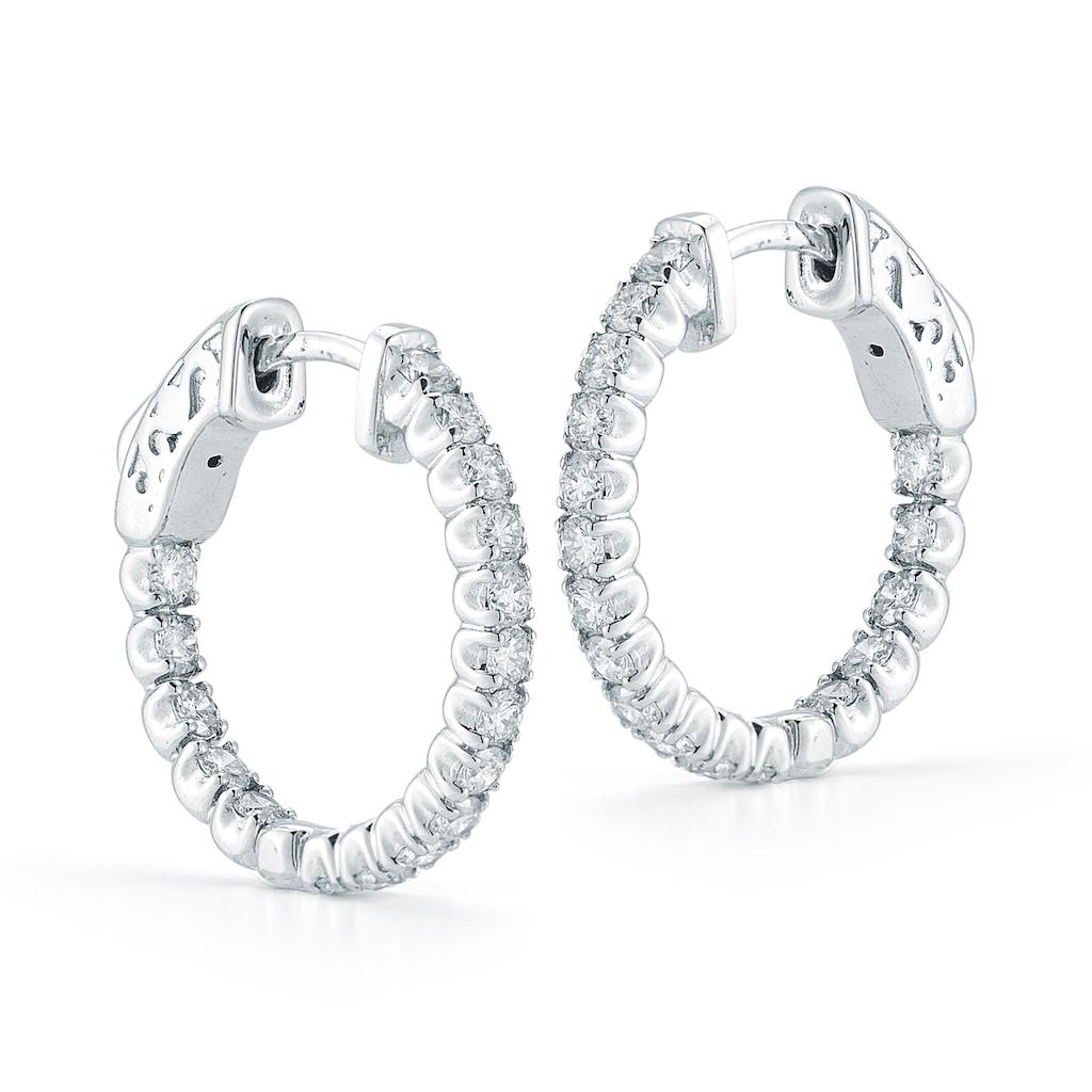 Beautiful diamond hoop earrings crafted in white gold set with high quality E color diamonds. These are diamond hoop earrings that will sparkle a mile away. Something like this is what you'll see on red carpet. Yet, since it's only one inch long you