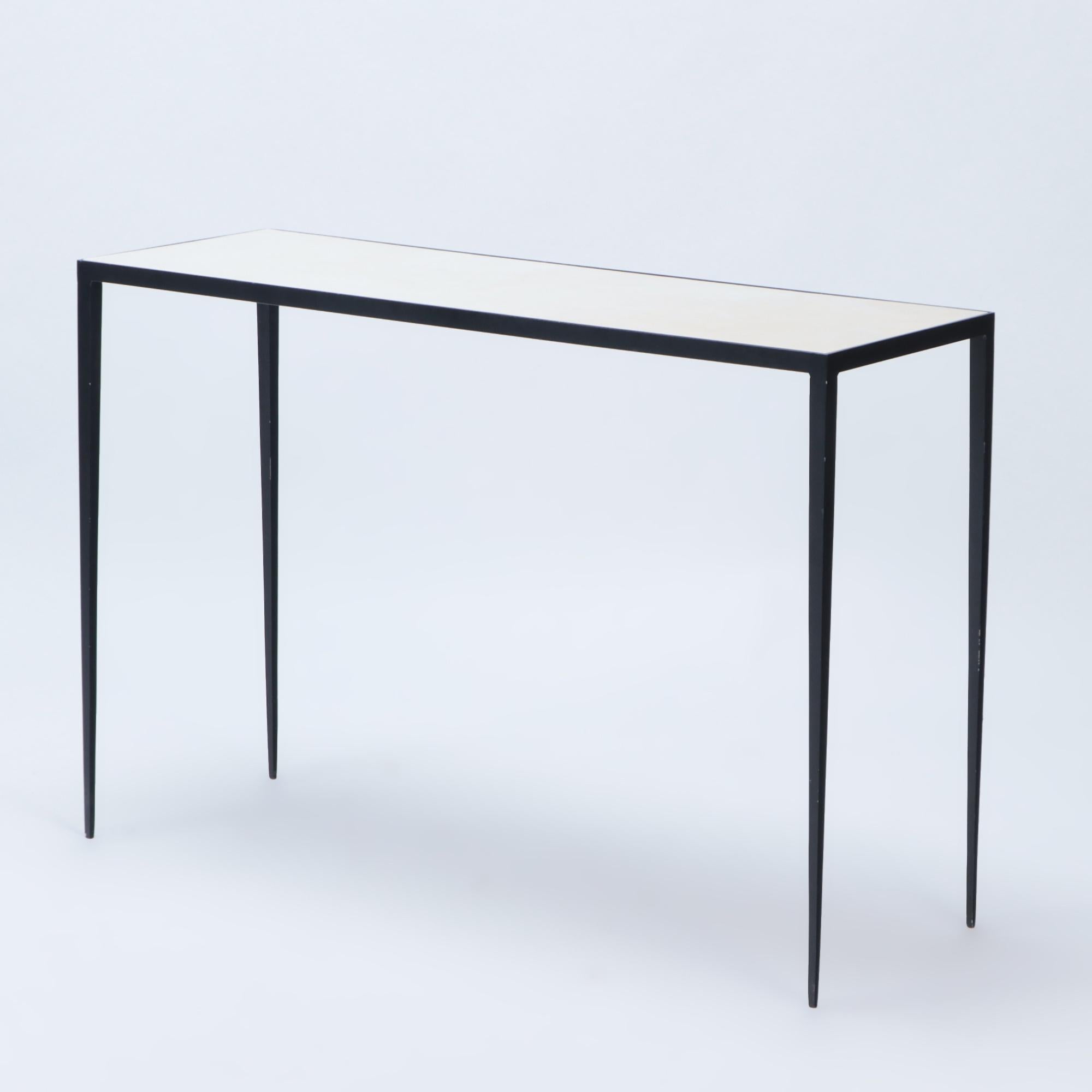 One iron and parchment console in the manner of Jean Michel Frank. Contemporary.