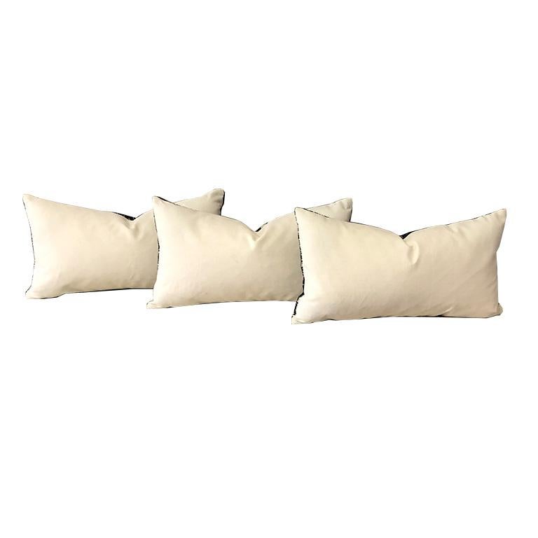 One down filled lumbar pillow in Kelly Wearstler's Wisk in Shadow. Pillow in covered in this Wearstler fabric on the front and in a cream linen on the back. Pillows include a down fill insert and have zipper closure with knife edges. 

Custom