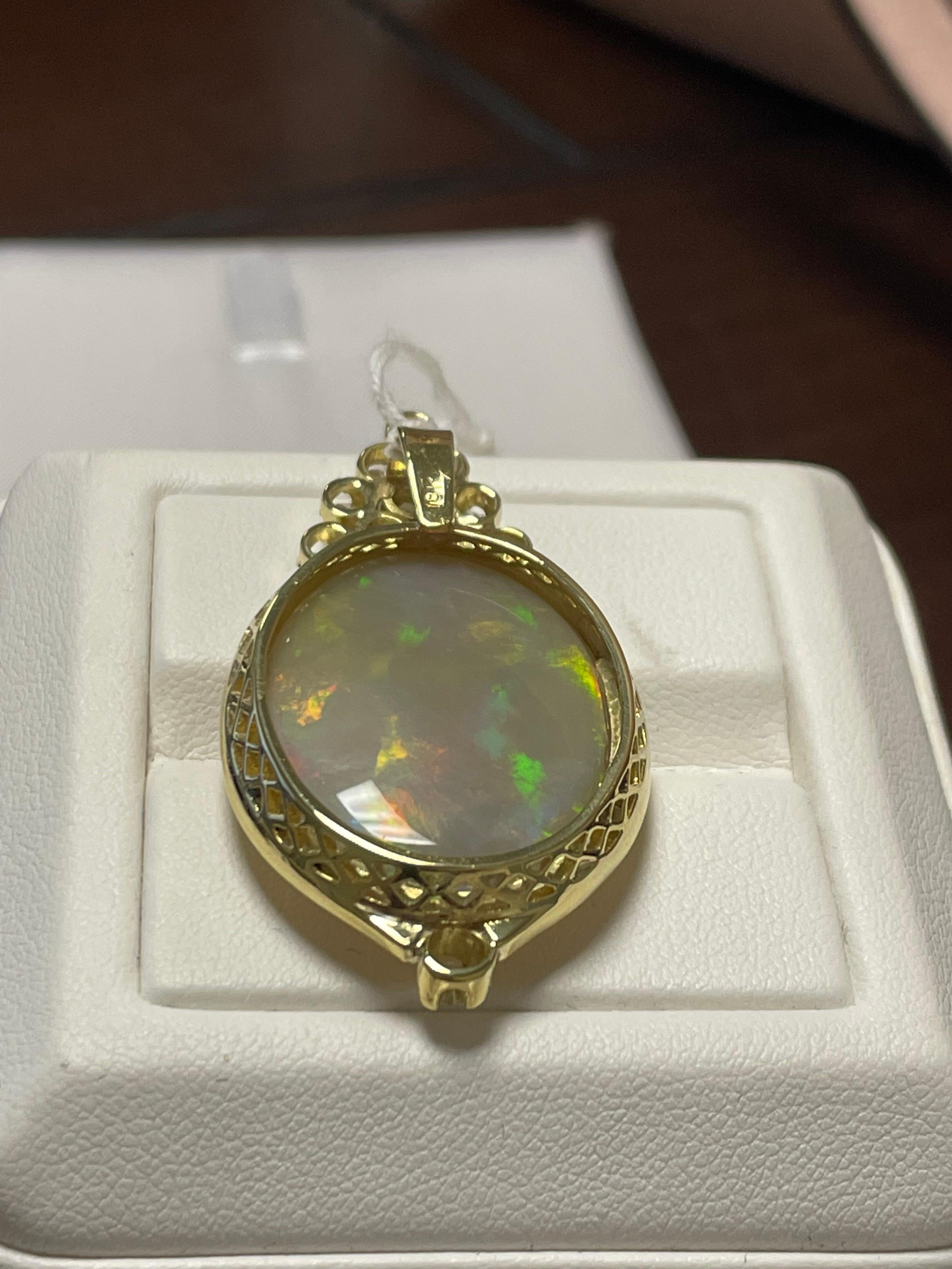 One Lady's Black Opal and Diamonds Pendant in 18k Yellow Gold  In Good Condition For Sale In New York, NY
