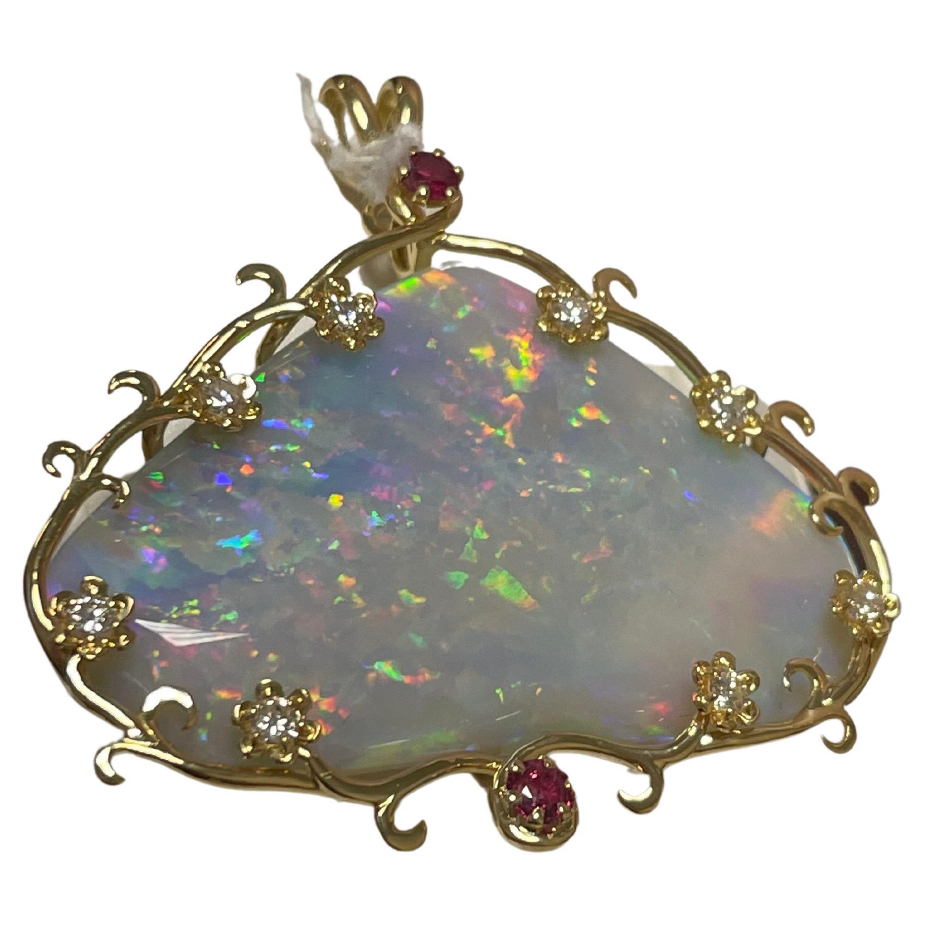 One Lady's Opal, Diamonds and Rubies Pendant For Sale