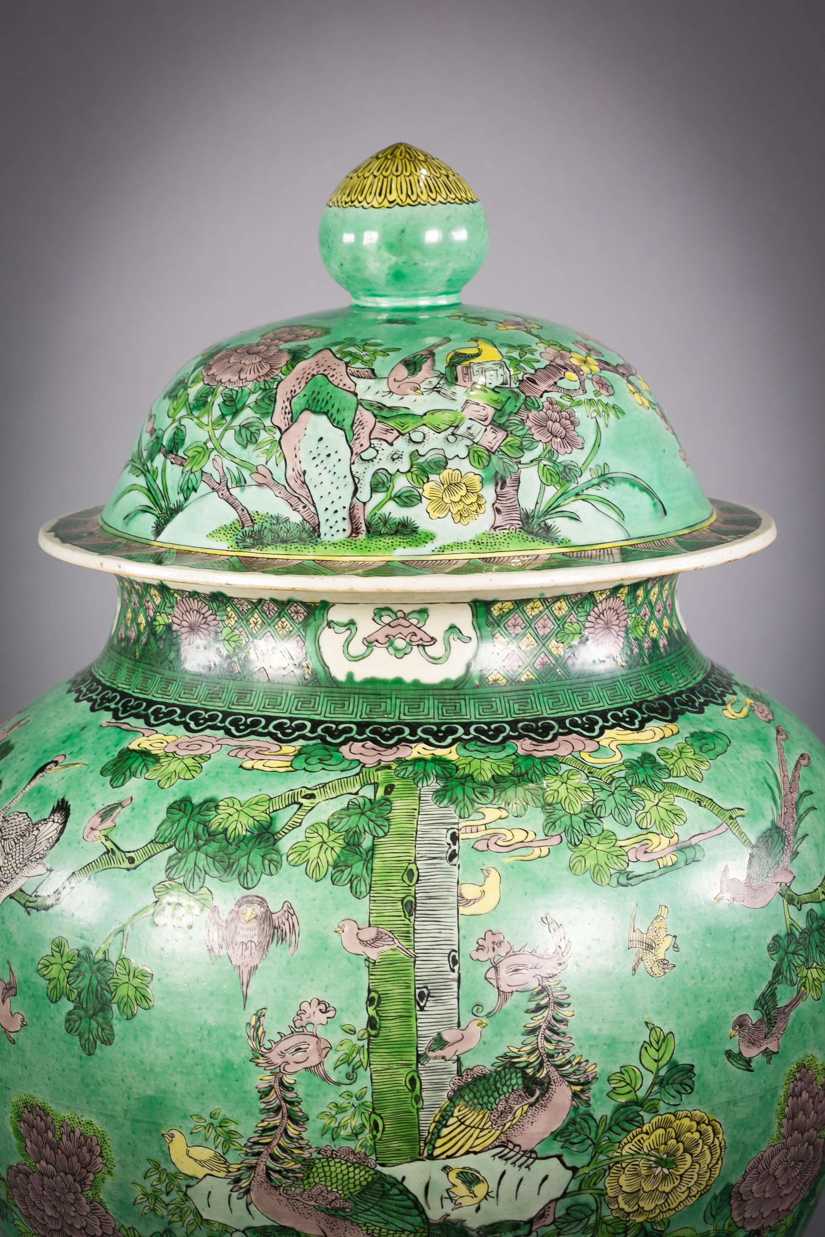 One large Chinese porcelain Famille Verte covered vase on stand, circa 1860.