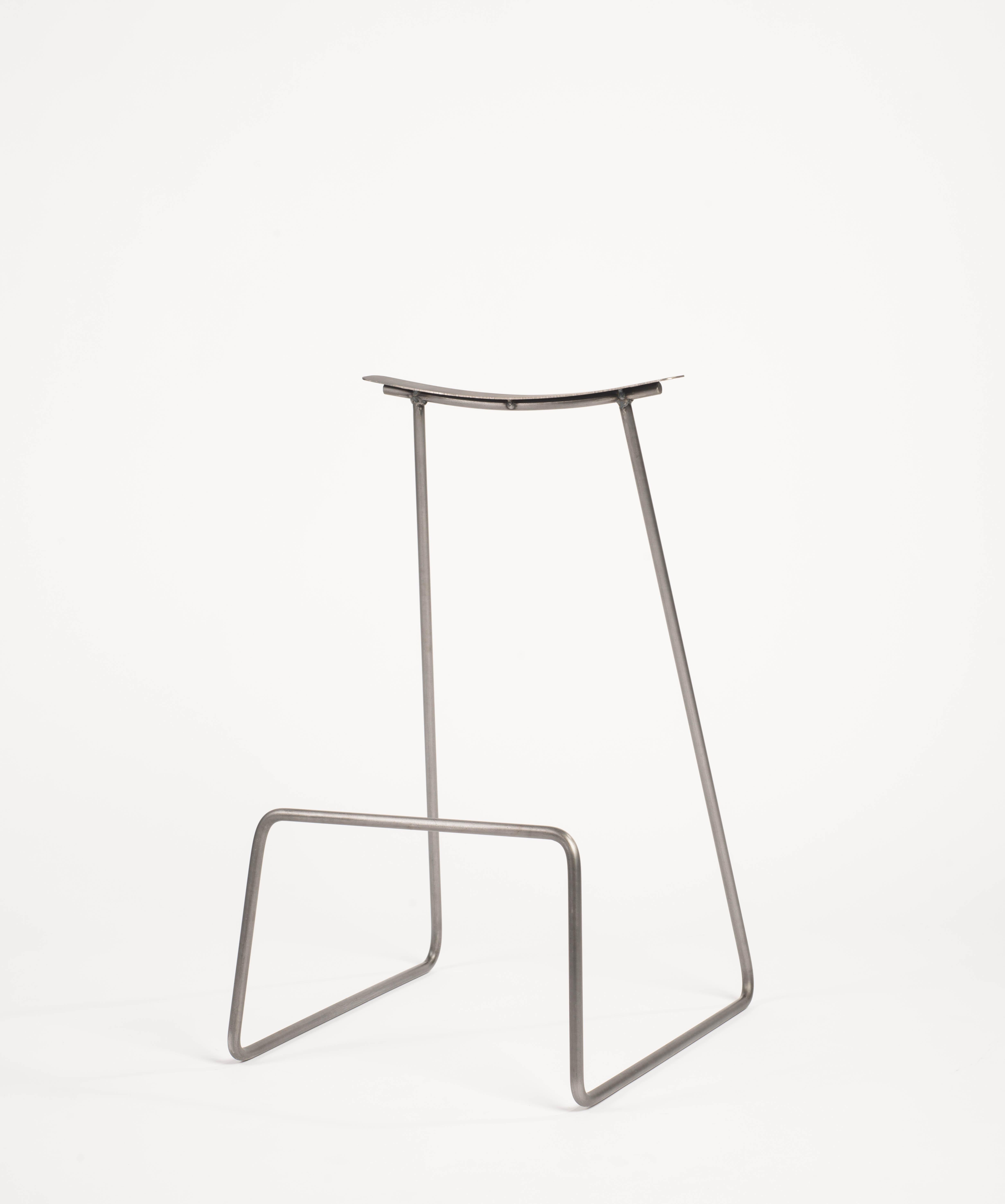 One line stool by Neil Nenner
Punctuation Marks
Dimensions: Height 70 x Length 45 x Width 40 cm
Materials: Steel tubes and rods with a natural finish
 Corten sheets 
 
Neil Nenner (b.1977, Kibbutz Mevo Hama), Independent designer / Artist and