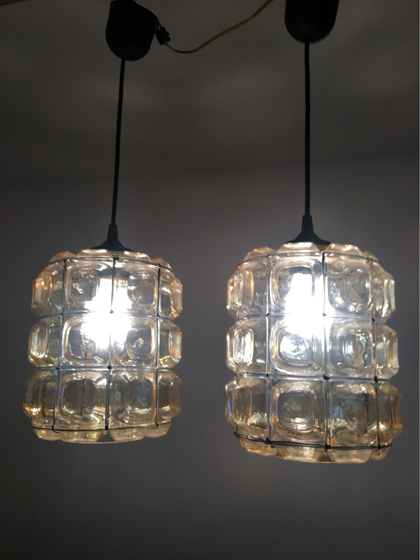 This nice pair of Limburg style lamps from Germany can be adjusted to a height between 15 to 35 inches depending on your personal needs. This pretty pair of lights require 3 E 27 European Edison bulbs each up to 60 watt. They are sold at a great