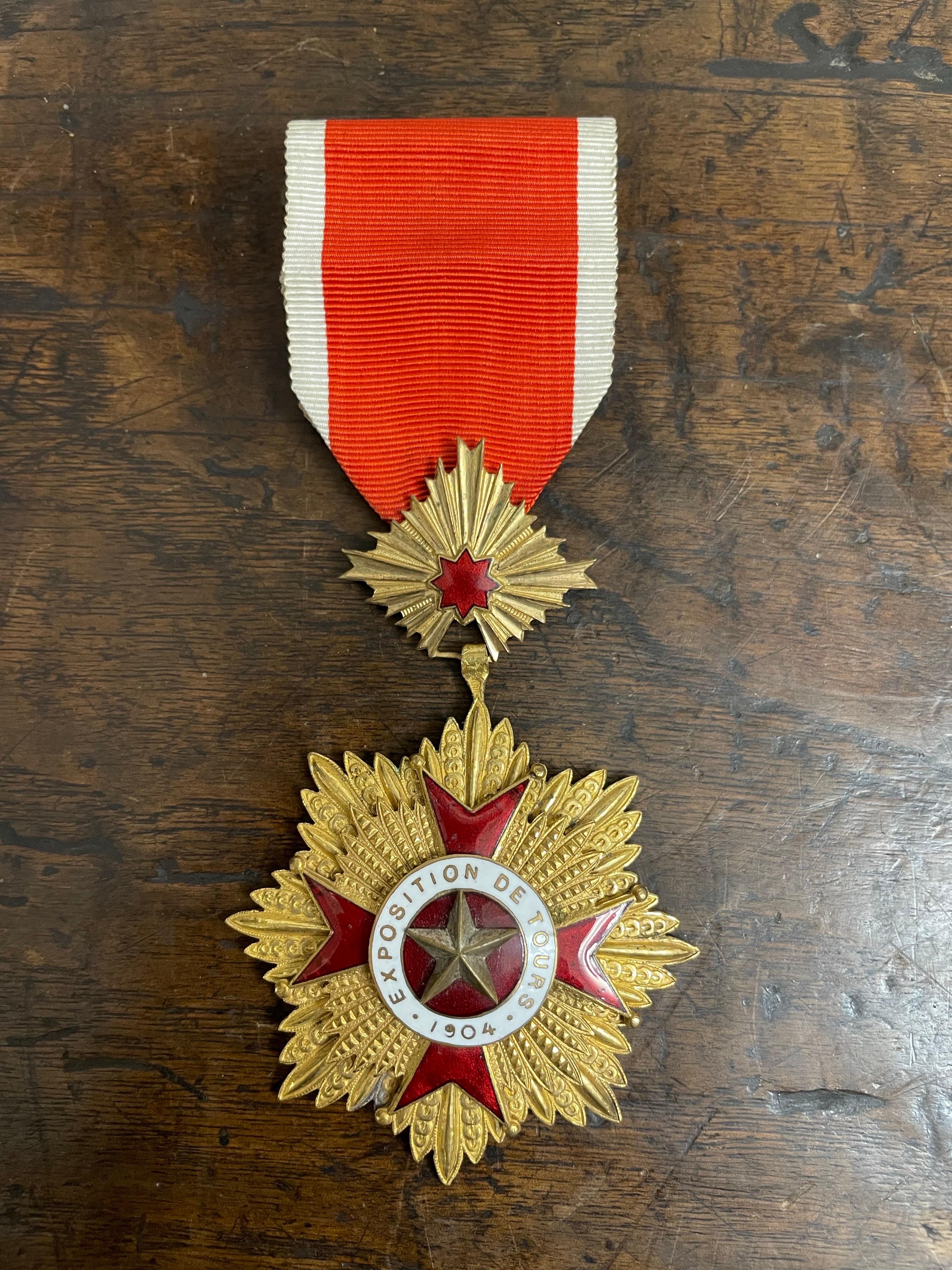 One Medal EXPOSITION, DE TOURS 1904

Provenance: Private Melbourne Collection.

Dimension: Height: 9 cm Width: 6 cm Depth: 2mm.