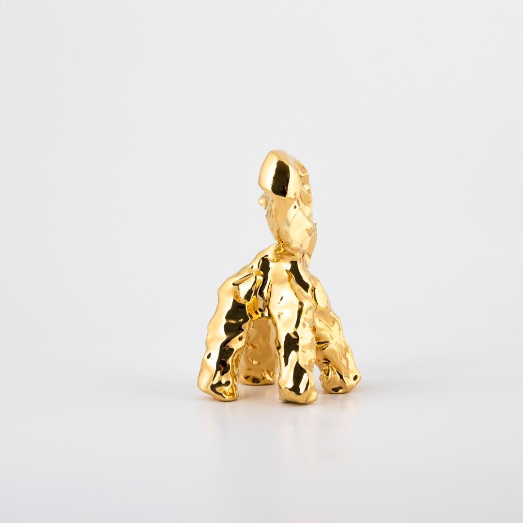 One-minute-sculpture. The name says it all! 
The one-minute-sculpture is made of clay, coated with a gold luster. 

From inspiration during playtime with Marcel’s daughter, Joy, comes iconic handmade objects created in the timeframe of just one