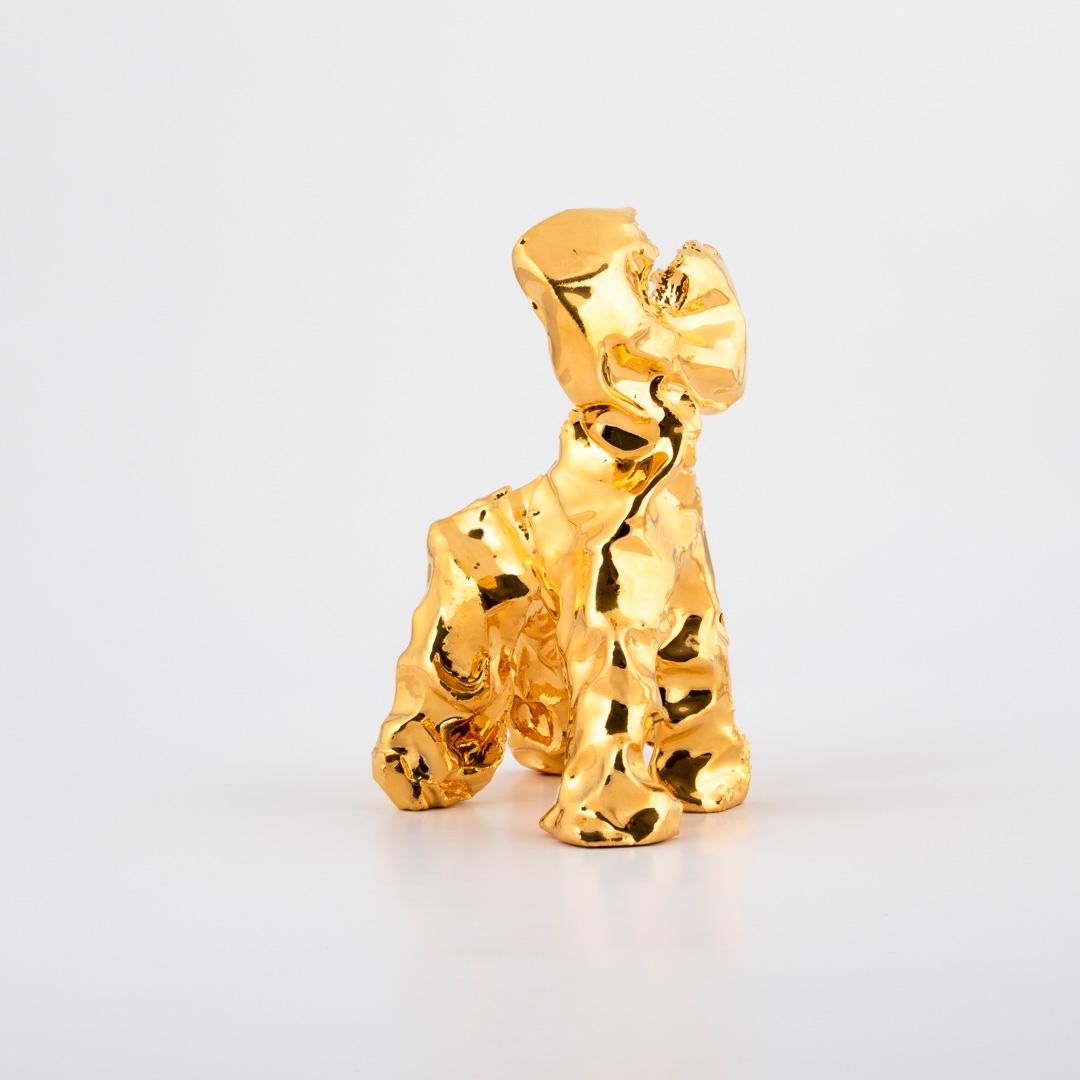 One-minute-sculpture the name says it all! 
The one-minute-sculpture is made of clay, coated with a gold luster. 

From inspiration during playtime with Marcel’s daughter, Joy, comes iconic handmade objects created in the timeframe of just one