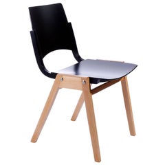 One of Ten Roland Rainer Stacking Chairs P7, Bicolored Beech Black Austria, 1952