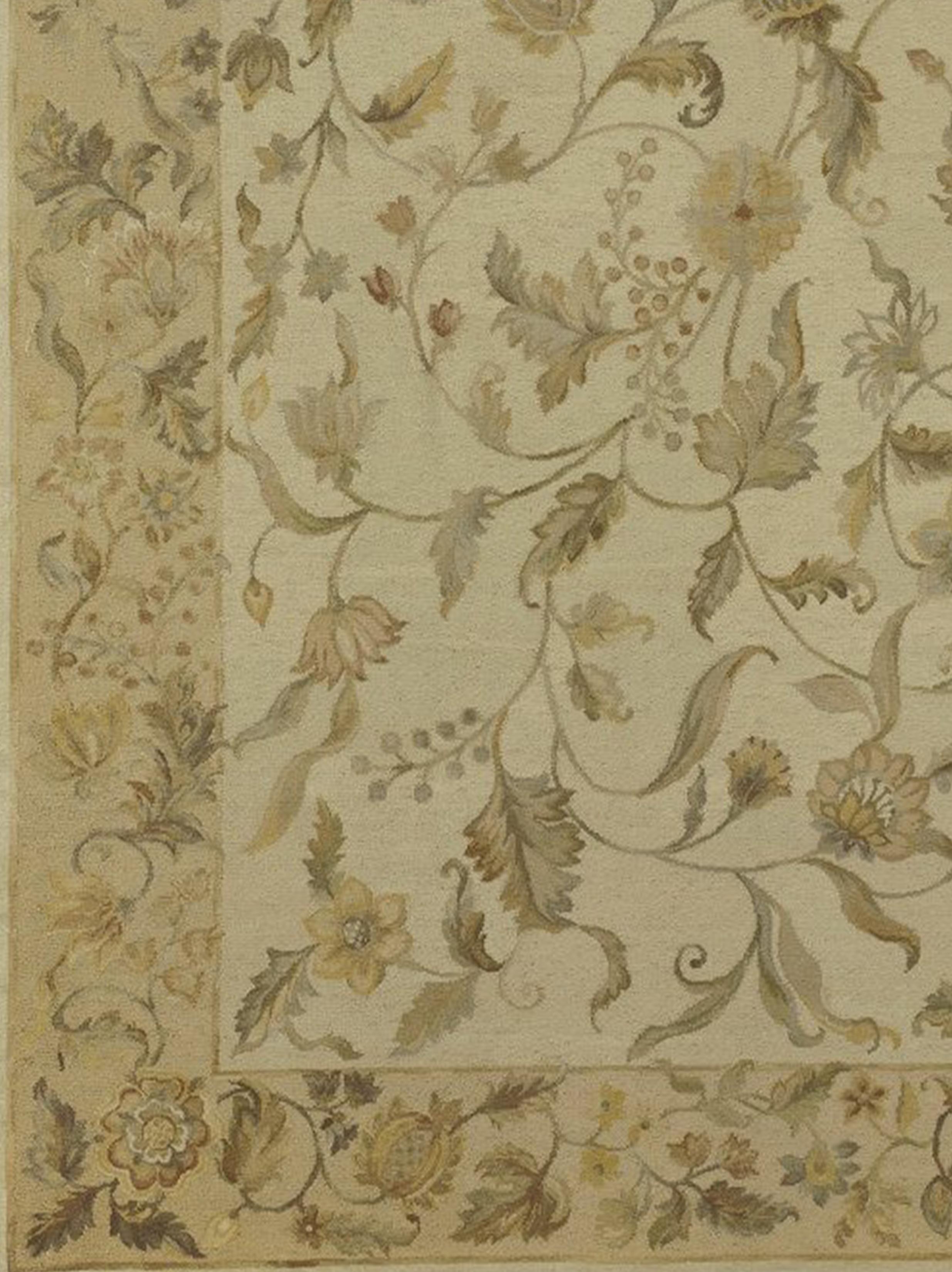 Gray-blue, dark sienna, khaki, green, yellow and gold fantasy botanical motifs on a yellow and gold background in a design based on an original Asmara painting by Elizabeth Moisan inspired by Jacobean embroideries and Pontremoli needlepoint rugs