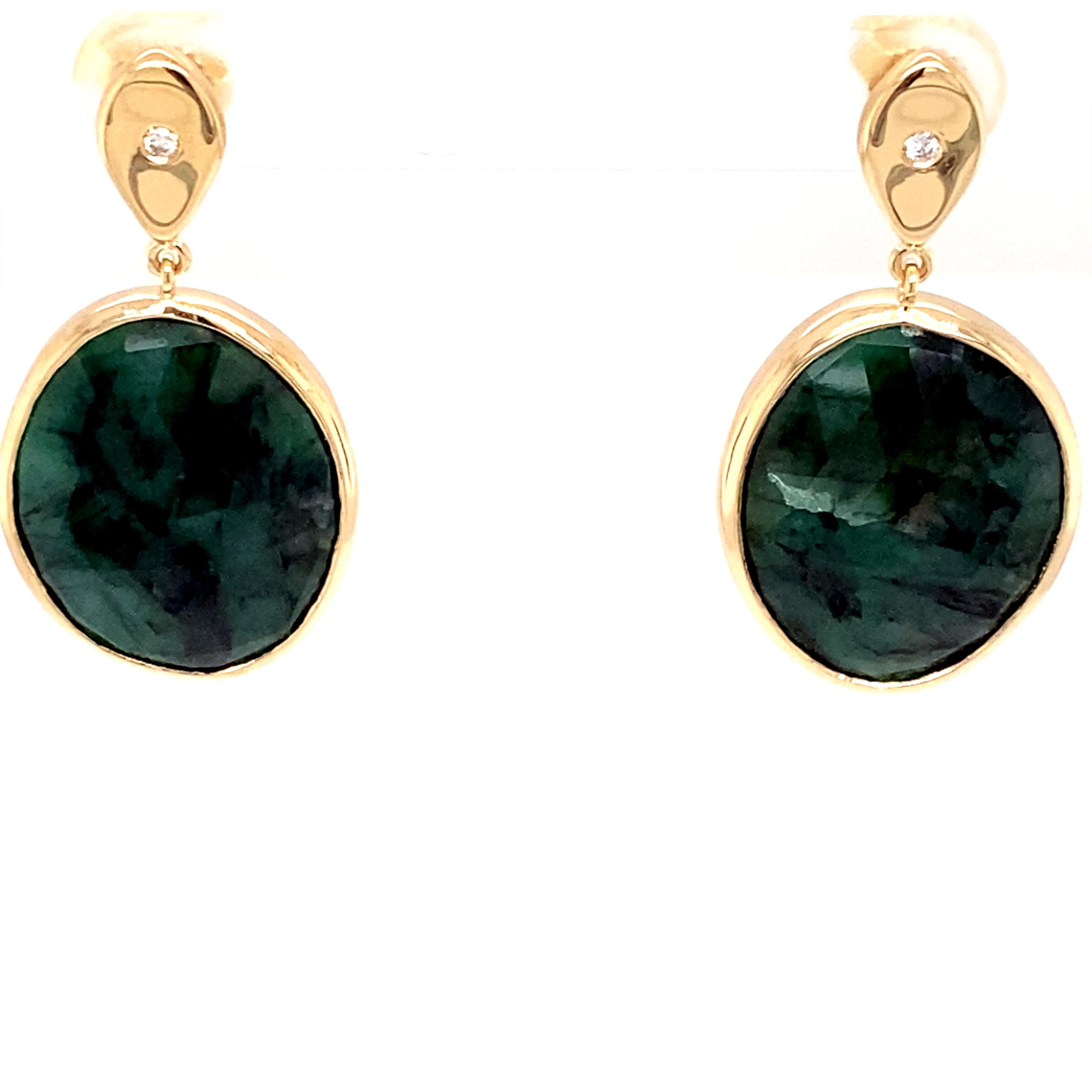 These earrings feature meticulously cut and polished emerald slices, each radiating a captivating green hue that is both vibrant and alluring.

Crafted from the finest materials, these earrings boast a sleek and sophisticated design that complements