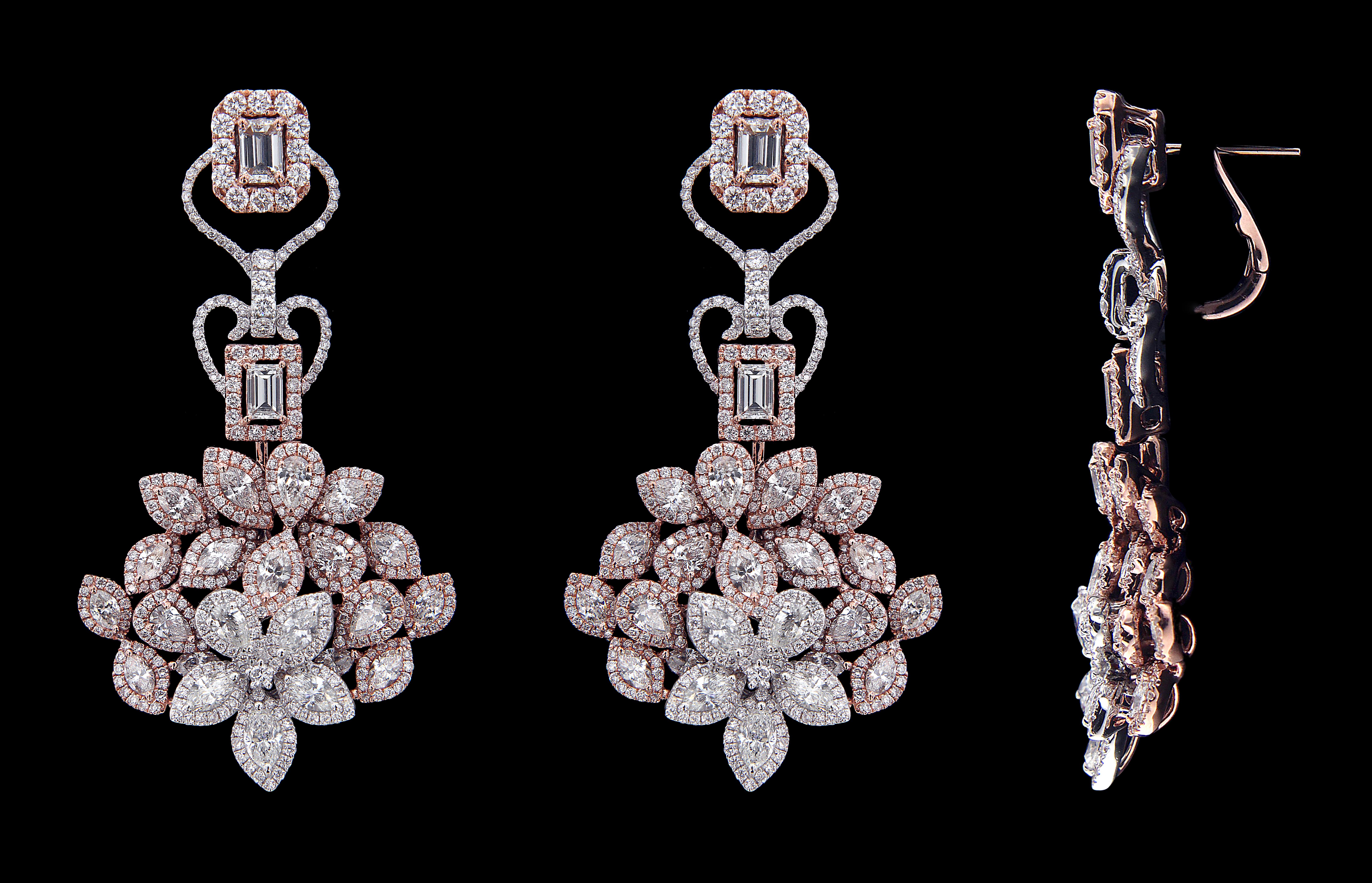 One Of A Kind 18 Karat Pink Gold and Diamond Earrings.

Diamonds of approximately 7.90 carats and mounted on 18 karats pink gold earrings. The earrings weigh approximately 25.23 grams.

Please note: The charges specified do not include any shipment,