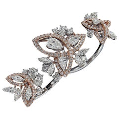 One of a Kind, 18 Karat White and Pink Gold, and Diamond Dual Loop Ring One of a Kind, 18 Karat White and Pink Gold, and Diamond Dual Loop Ring