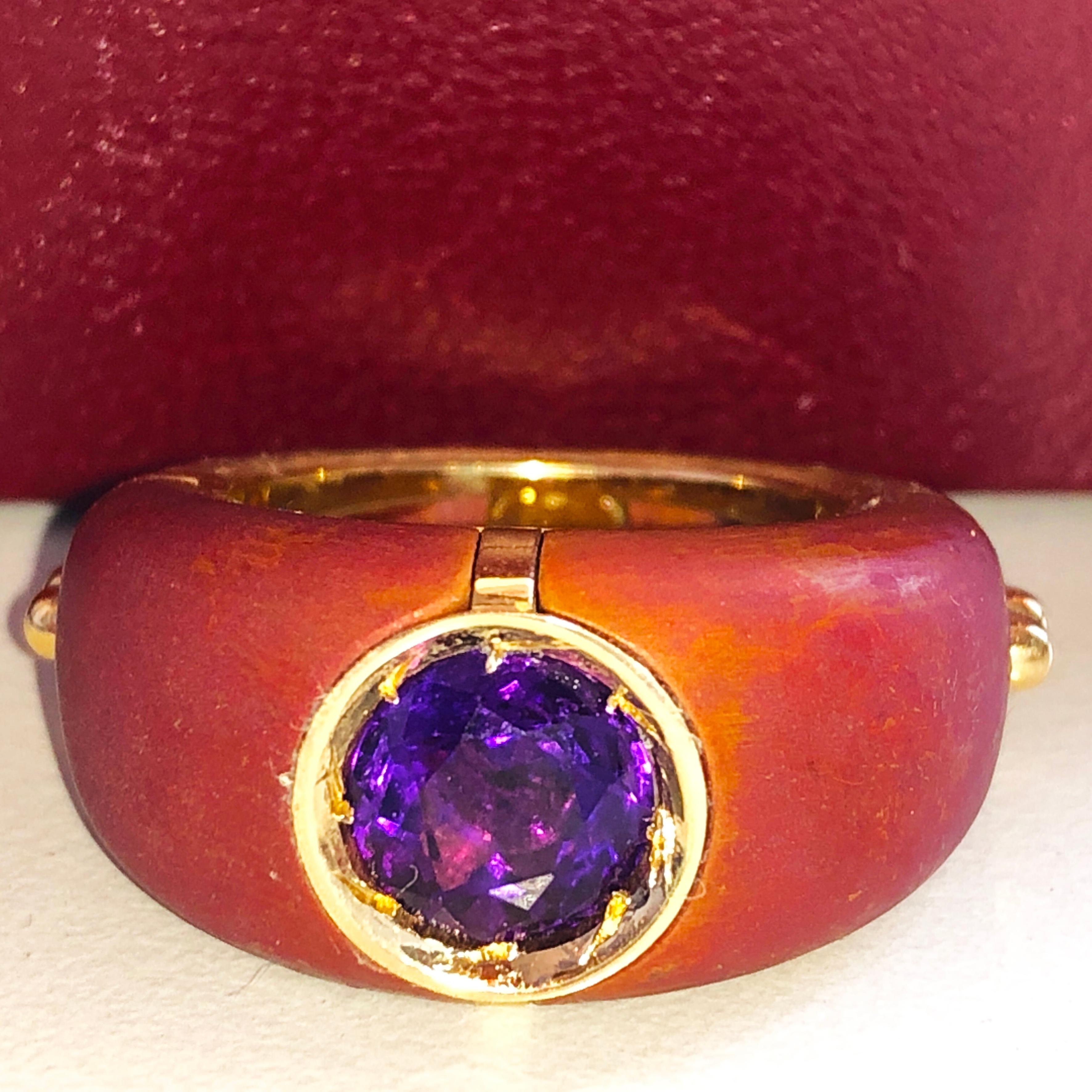 One-of-a-kind Contemporary Cocktail Ring Featuring a 1.83 Carat Natural Brilliant Cut Amethyst in an 18K Yellow Gold Red Hand Oxidized Brass, similar to an Antique Chinese Lacquer Finish, Setting.
The purple of  Amethyst combined with Gold and Red