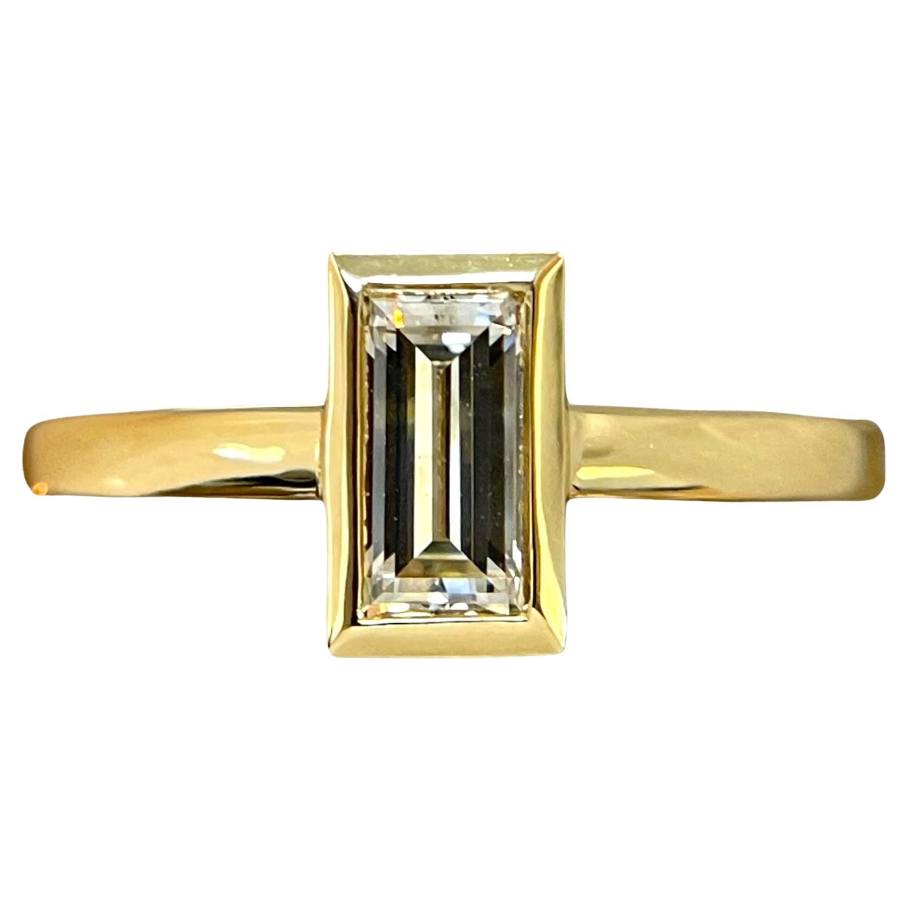 One of a kind 18K Yellow Gold Bezel Baguette Diamond Ring For Sale