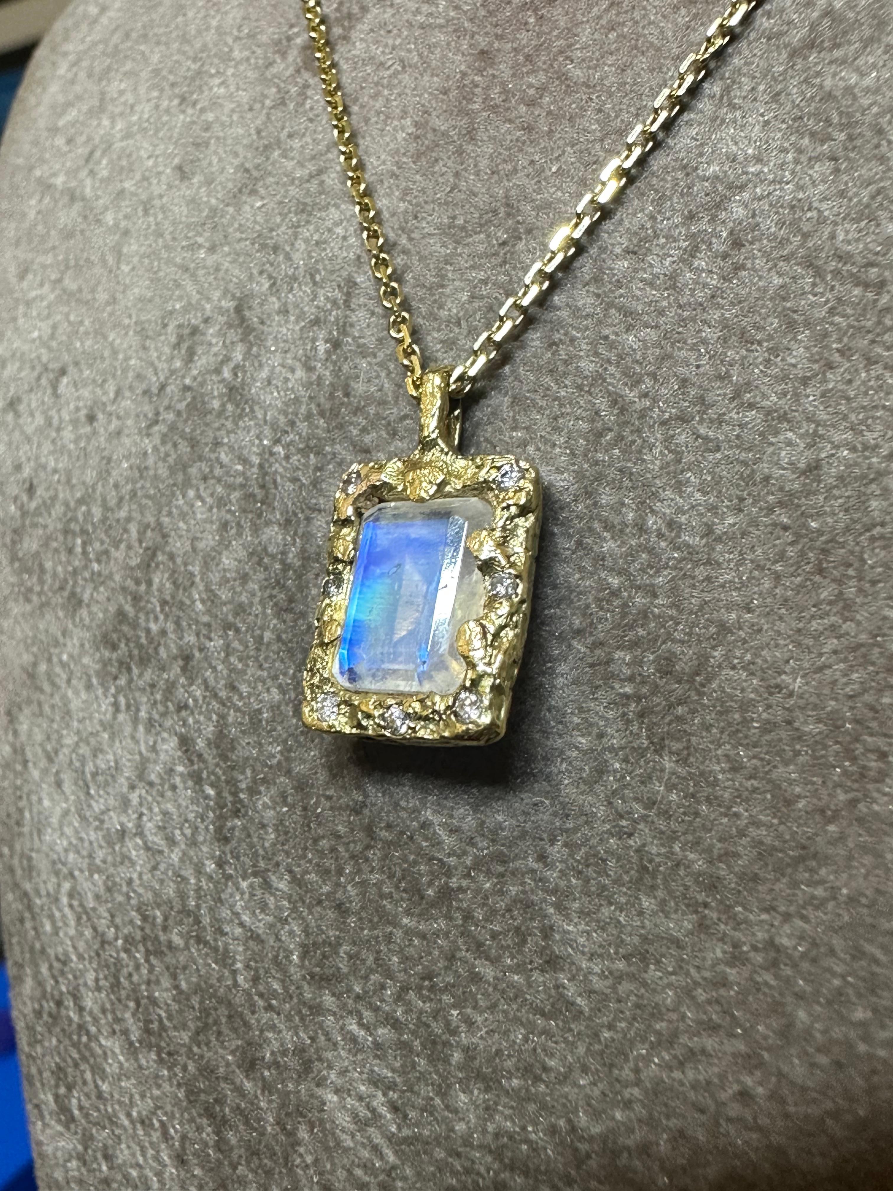 A magical one of a kind 18K Yellow Gold handmade emerald cut moonstone pendant with diamonds
Wear it as a standalone or layer it with other necklaces.

One of a kind
18K Yellow Gold
7 X brilliant cut diamonds of I-J colour, VSI - SI
It comes with