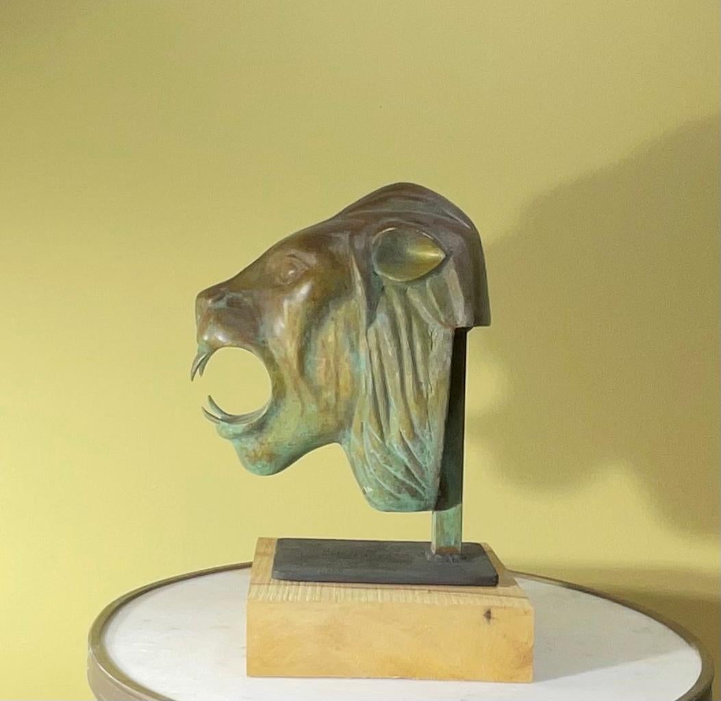One of a kind lion head statue, made of heavy cast bronze mount on solid steel
base.
Beautiful patina, exceptional object of art for display.