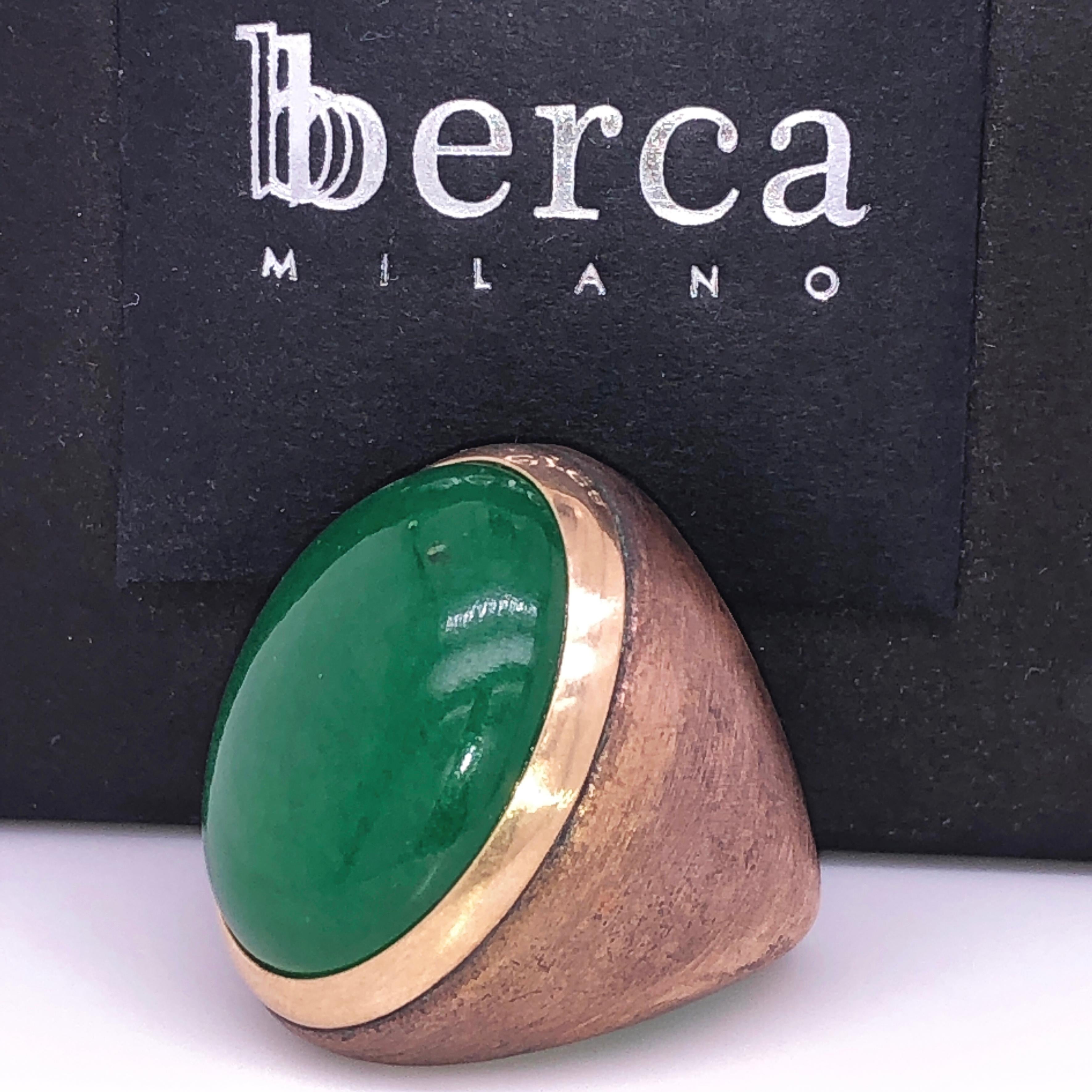 One-of-a-kind Contemporary Cocktail Ring Featuring a 22 Carat Natural Green Jade Cabochon (0.911x0.666in) in an 18K Yellow Gold Hand Oxidized Golden Brass Setting.
The color-changing of the Green Jade's cabochon combined with yellow gold and golden