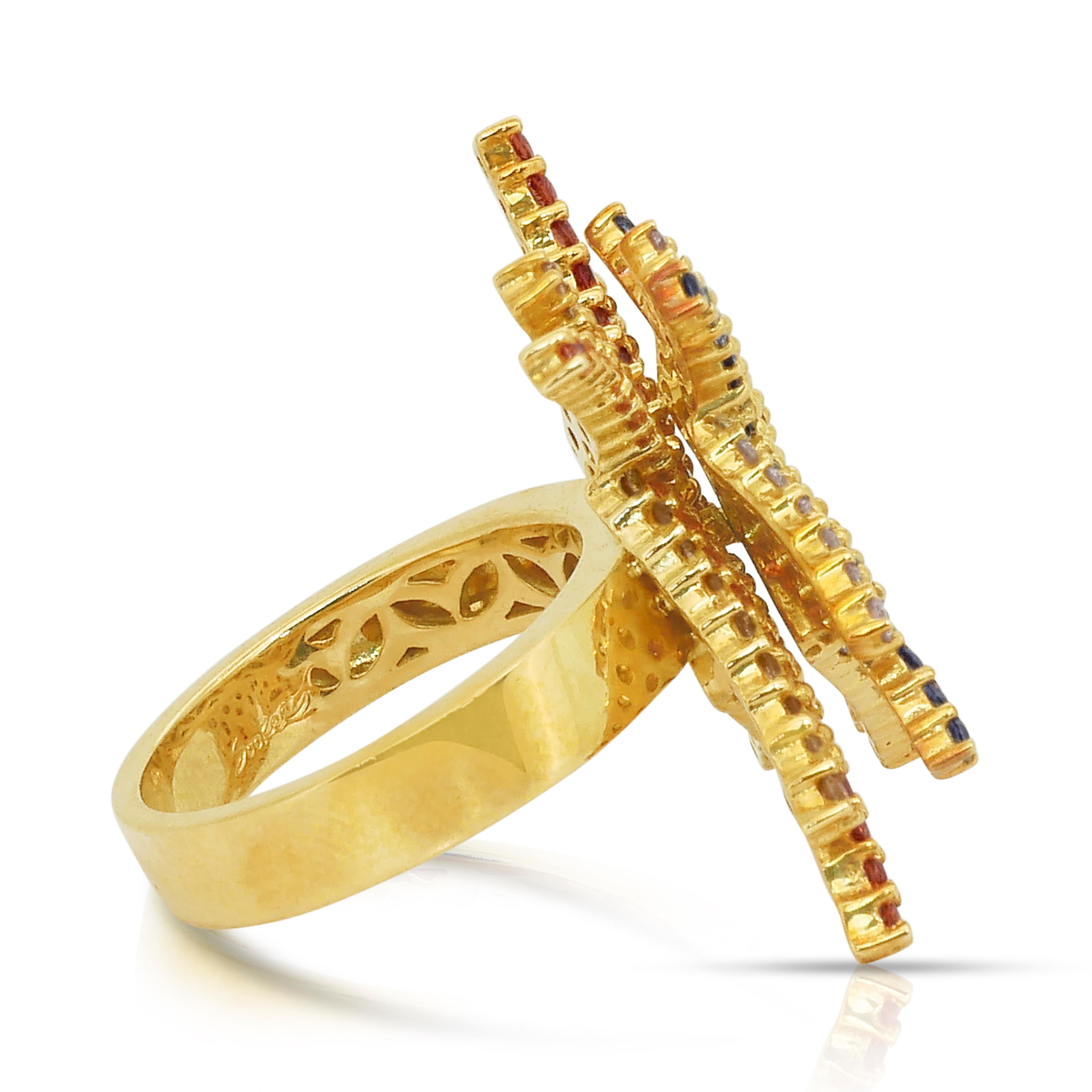 Bague unique en or jaune 18k de 3,15ct de saphirs et diamants - Certifiée IGI

Célébrez la couleur et l'artisanat avec cette captivante bague en or jaune 18 carats, ornée de 164 saphirs de taille ronde d'une valeur totale de 2,75 carats dans une