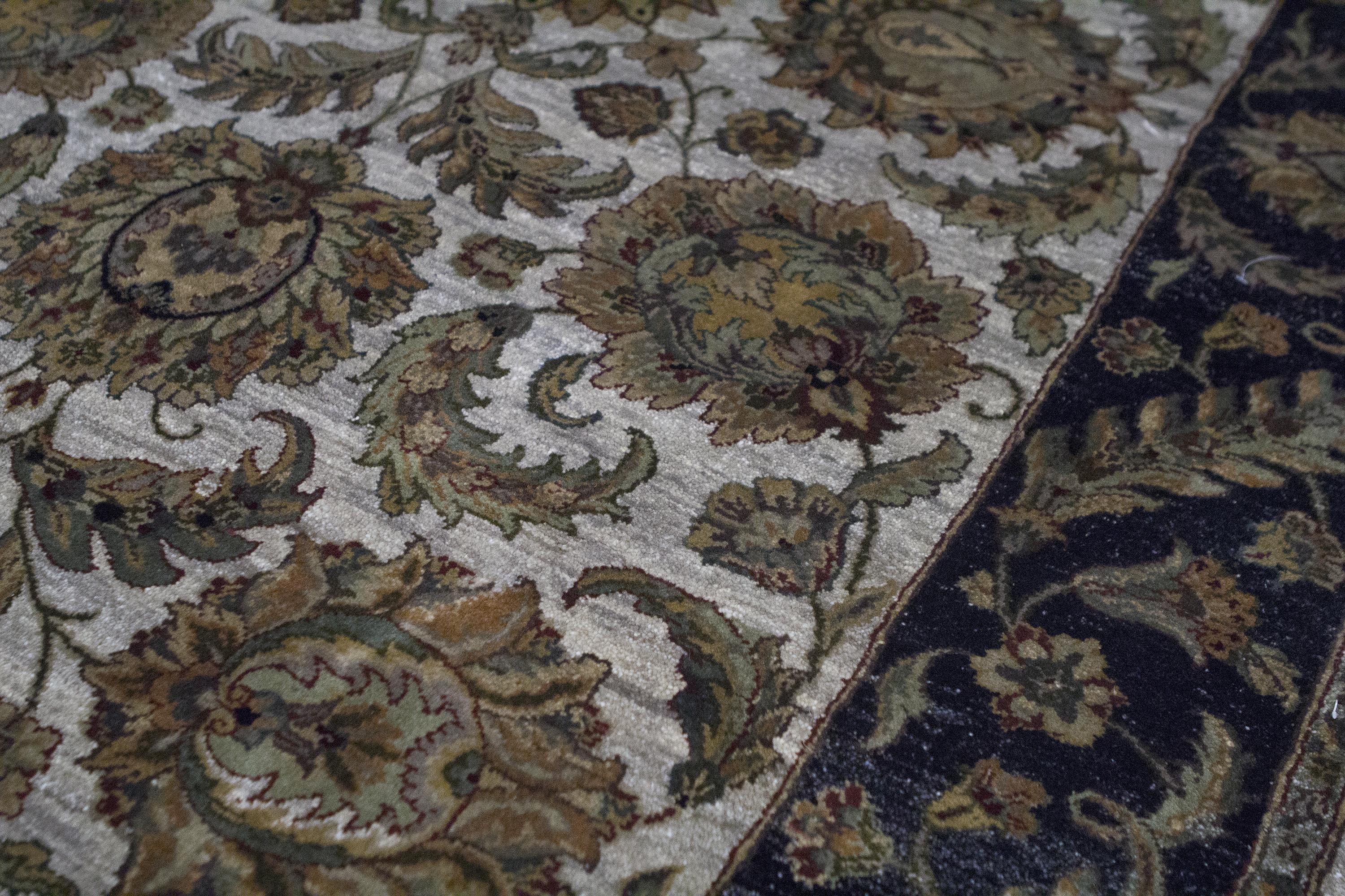 An introduction to master rug weaving from India. These designs are revivals of Agra patterns from the Oriental Mughul Period. What distinguish these handwoven Agra patterns, are the large floral palmettes. The new innovation of this rug collection