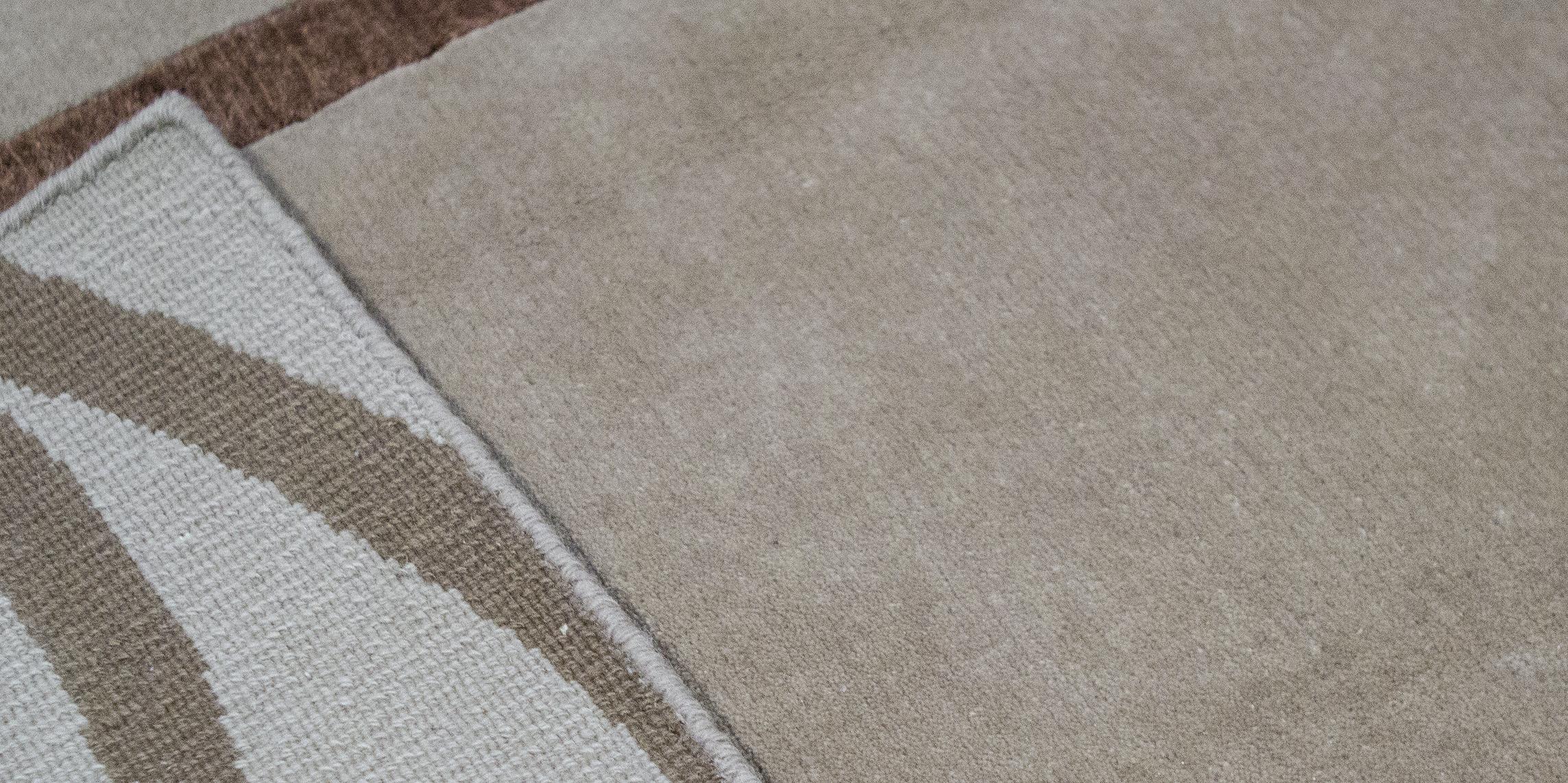 The true style of today is captured in this collection. The combination of wool and viscose in these hand woven rugs, creates a contemporary design, in soft color ways with an indulgent silky look. Measures: 6' x 9'-3