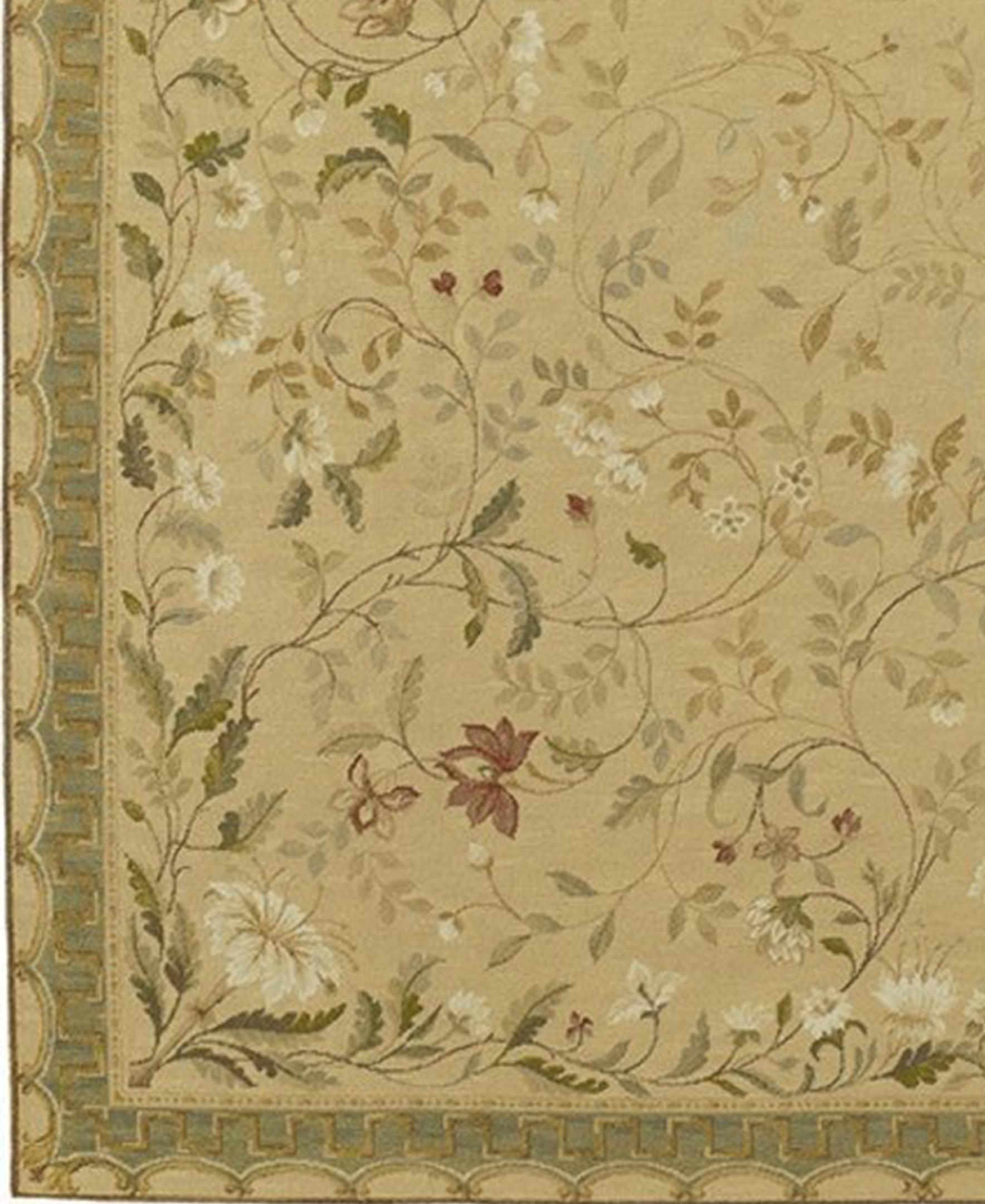 Pomegranate red and white flowers with sage and teal green leaves and tone on tone curving vines trail toward the center of a gold background with fresco like shading. The teal and gold border is a reminiscent of a chinoiserie canopy. Using ancient