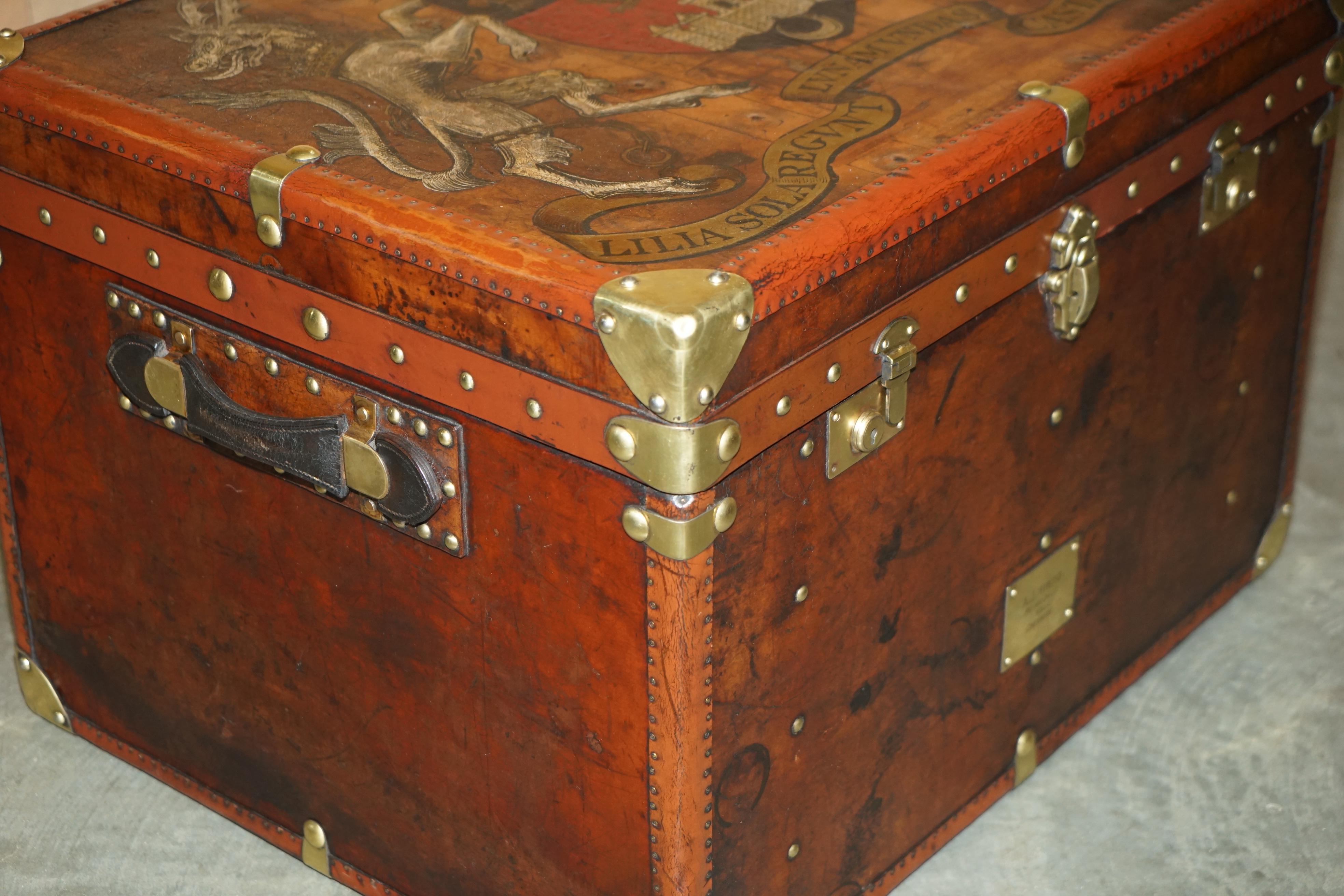 ONE OF A KiND ANTIQUE BROWN LEATHER STEAMER TRUNK WITH ARMORIAL COAT OF ARMS For Sale 6