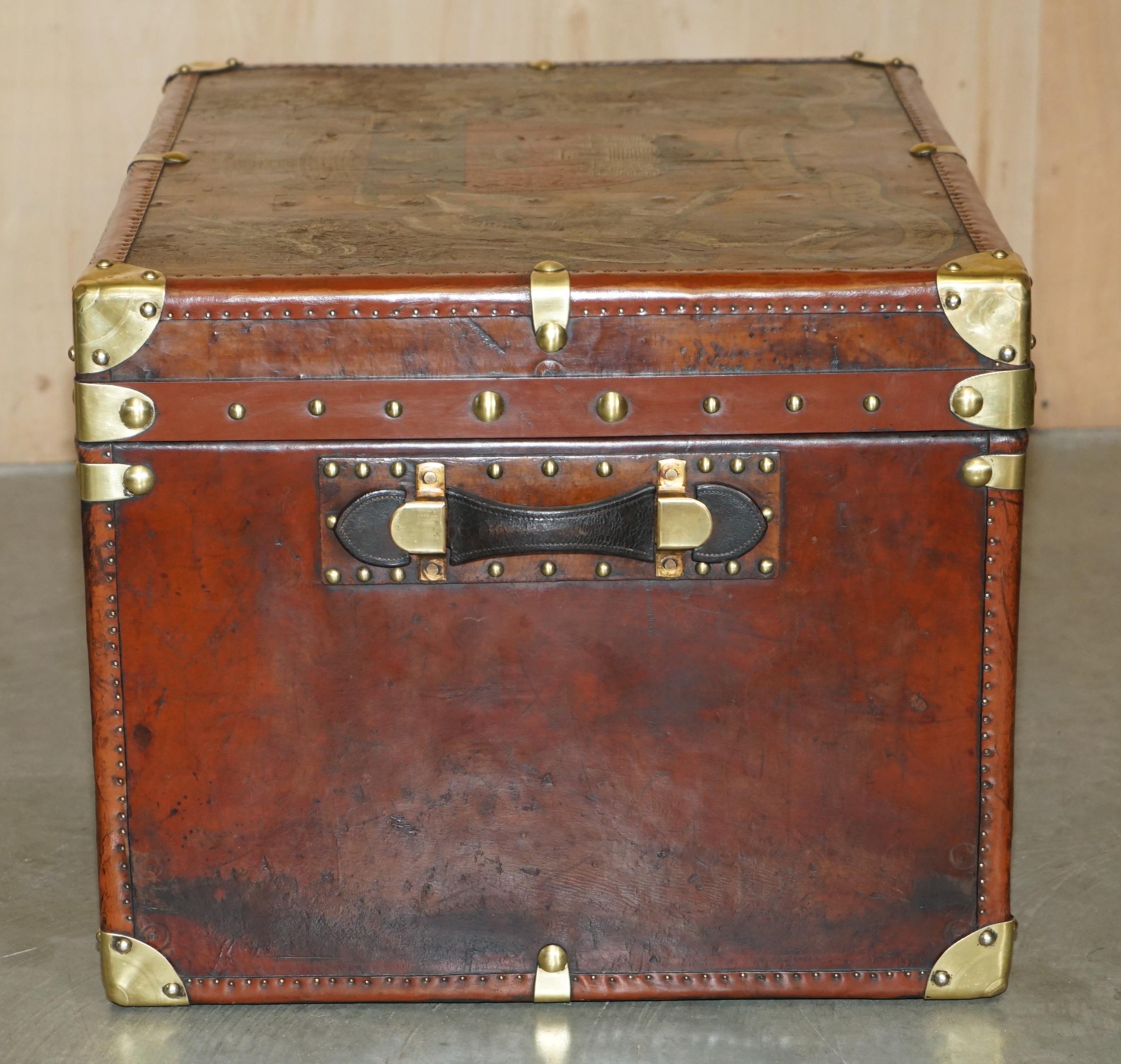 ONE OF A KiND ANTIQUE BROWN LEATHER STEAMER TRUNK WITH ARMORIAL COAT OF ARMS For Sale 7