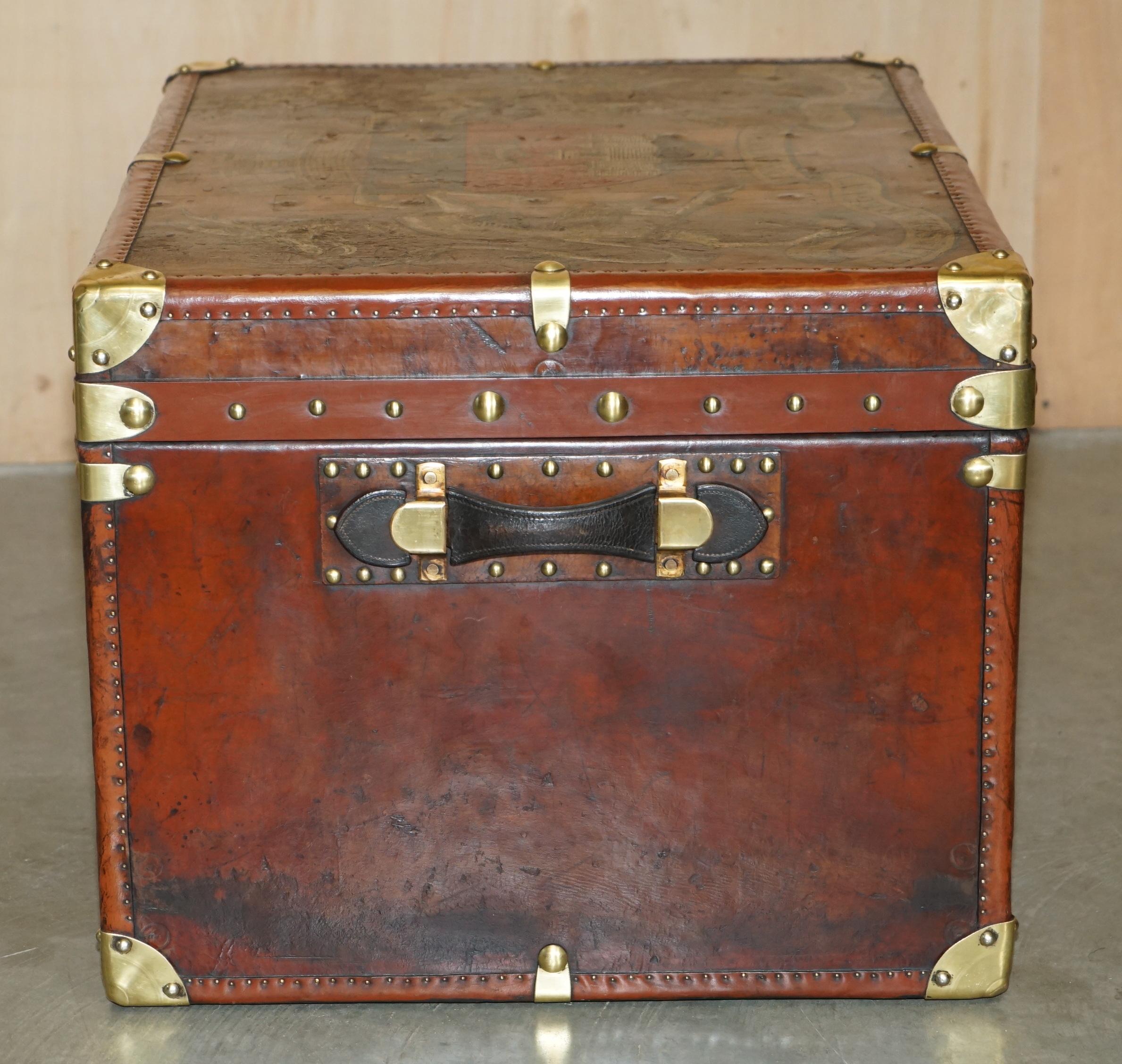 ONE OF A KiND ANTIQUE BROWN LEATHER STEAMER TRUNK WITH ARMORIAL COAT OF ARMS For Sale 6