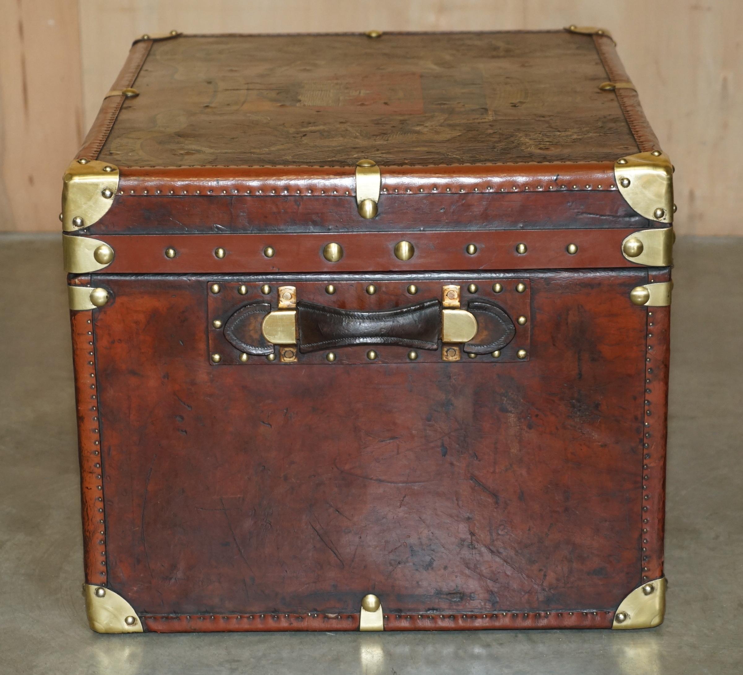 ONE OF A KiND ANTIQUE BROWN LEATHER STEAMER TRUNK WITH ARMORIAL COAT OF ARMS For Sale 9